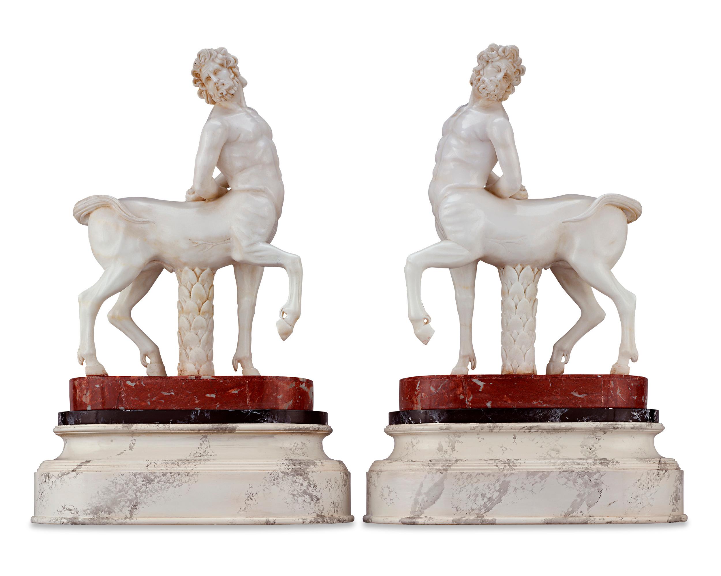 These remarkable Italian marble objets d'art are based on two of the most famous classical sculptures ever found, the Furietti Centaurs. These Roman marble centaurs were excavated together at Hadrian's Villa in December of 1736. The duo was named