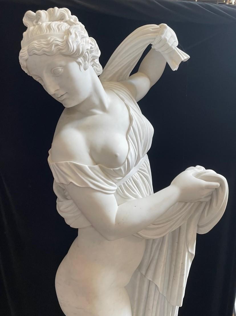 Sensational life size Italian hand carved white marble figure of standing nude woman on grey marble base. 2nd half ot the 20th century
Meticulous attention has been given to every details.
in a very good condition.