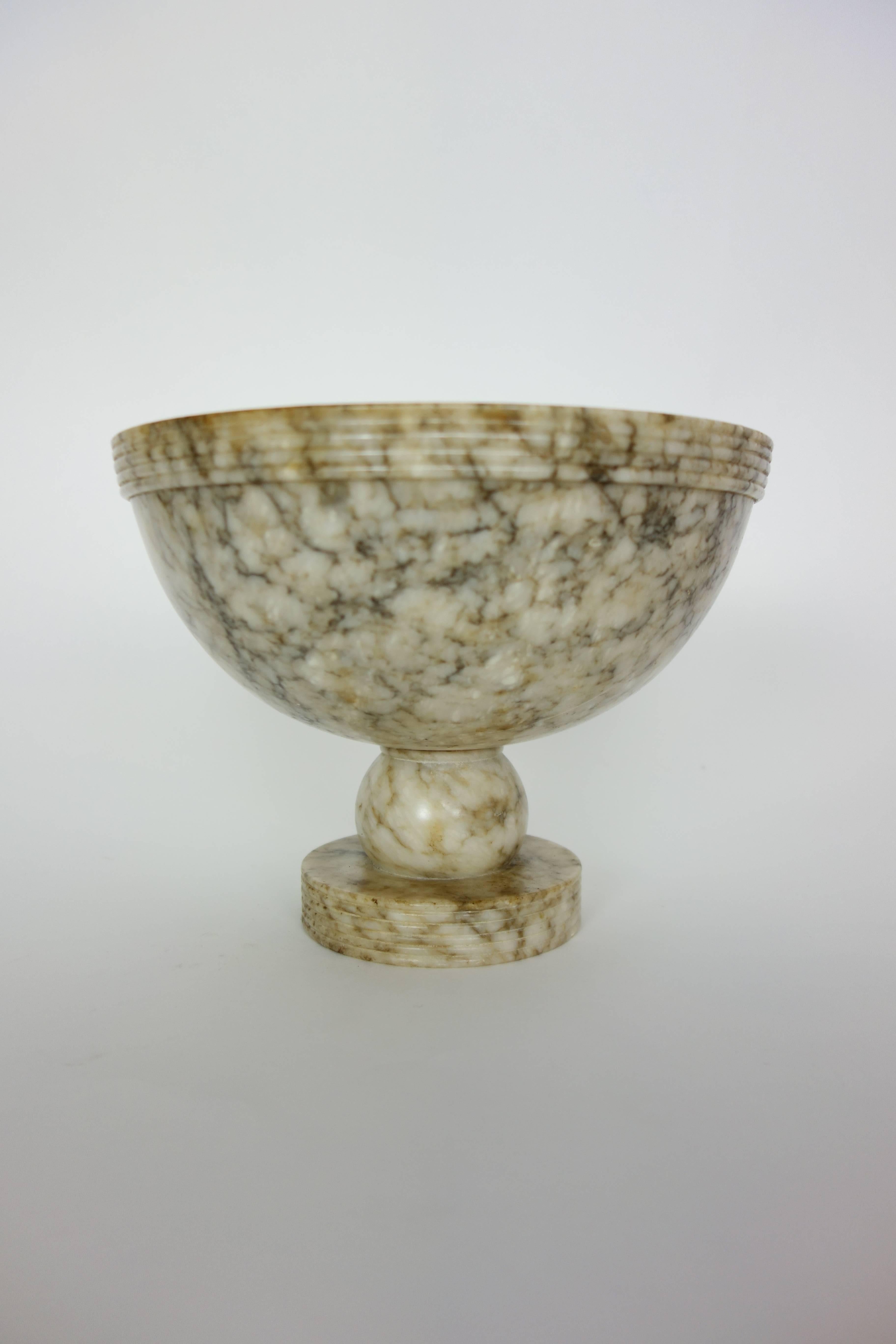 This is a beautiful carved alabaster marble pedestal bowl from Italy.