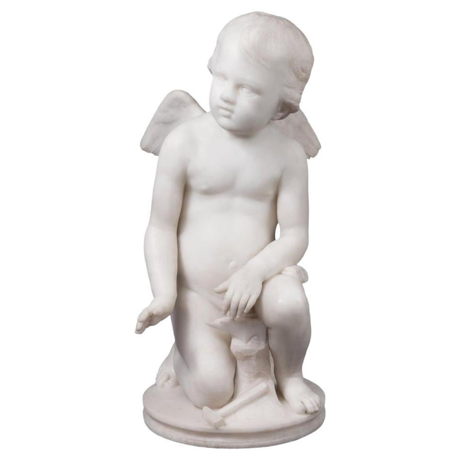Sculpture italienne en marbre d'un chérubin forgeant l'amour par Pio Fedi