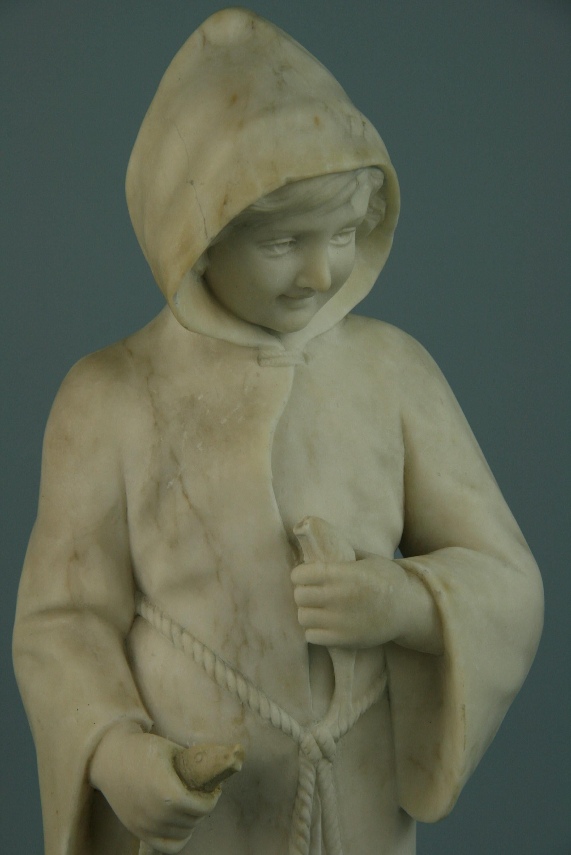 Italian Marble Sculpture of a Robed Child  Holding Two Fishes, Late 19th Century In Good Condition For Sale In Douglas Manor, NY