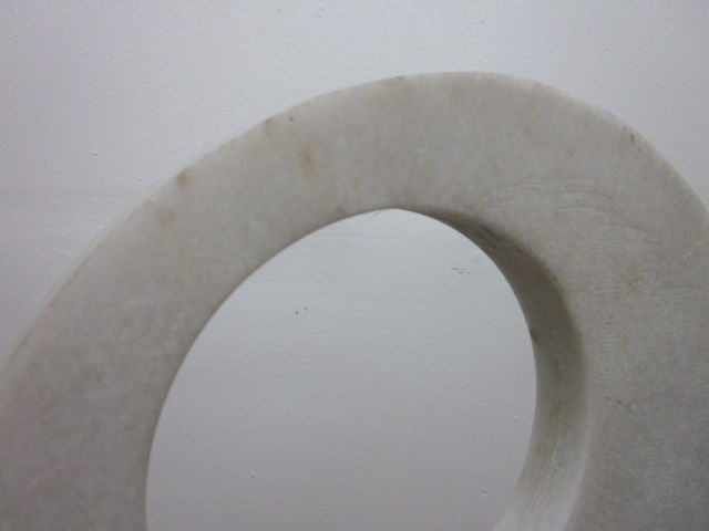 Round Italian marble sculpture on iron base.