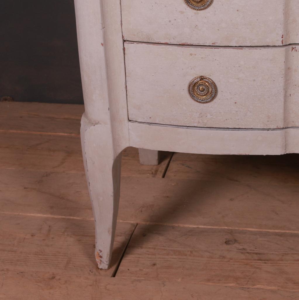 19th C Italian three drawer painted commode with a marble top, 1820.

Dimensions:
51 inches (130 cms) wide
21.5 inches (55 cms) deep
36 inches (91 cms) high.