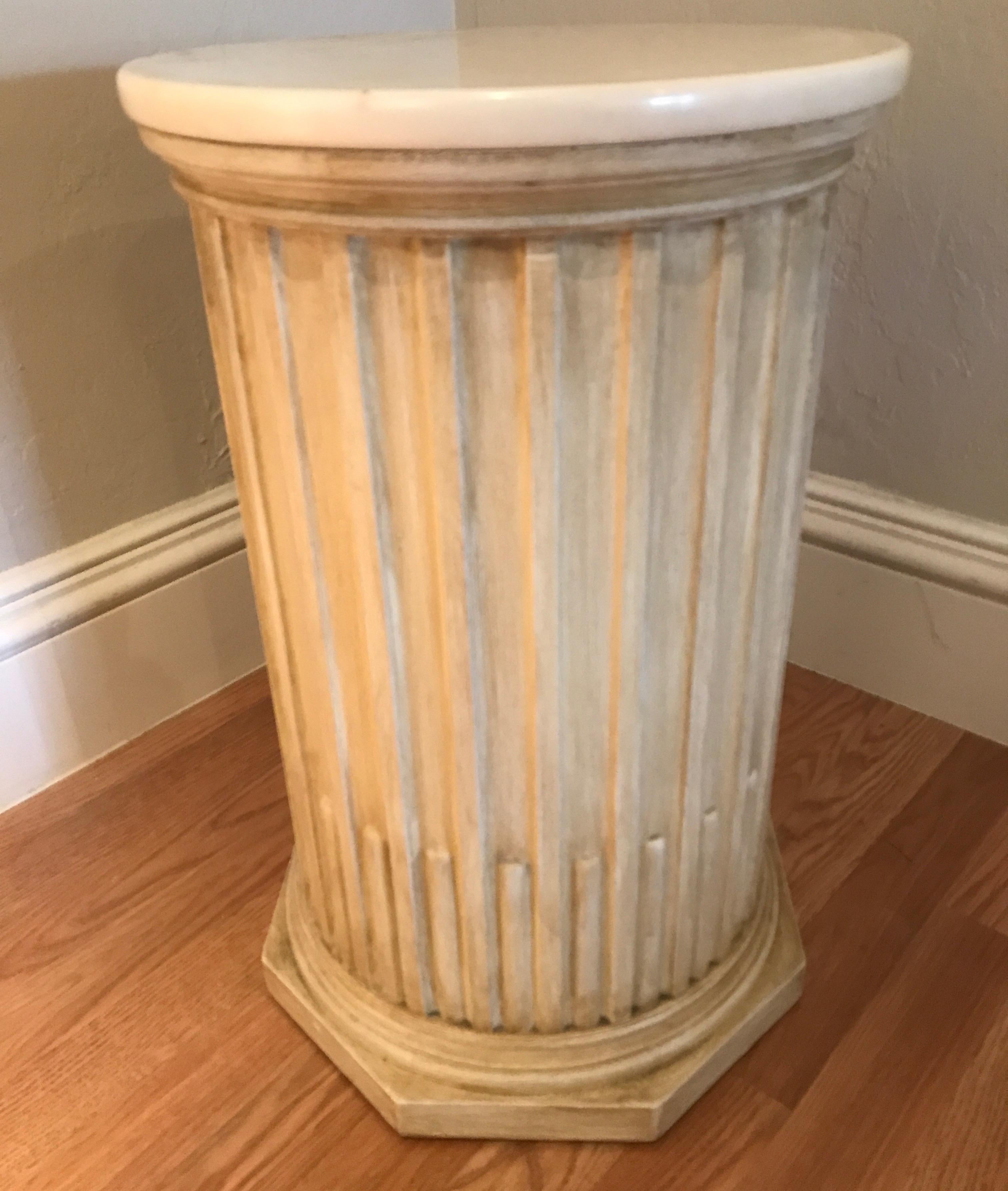 Antiqued white fluted wood pedestal with marble top.