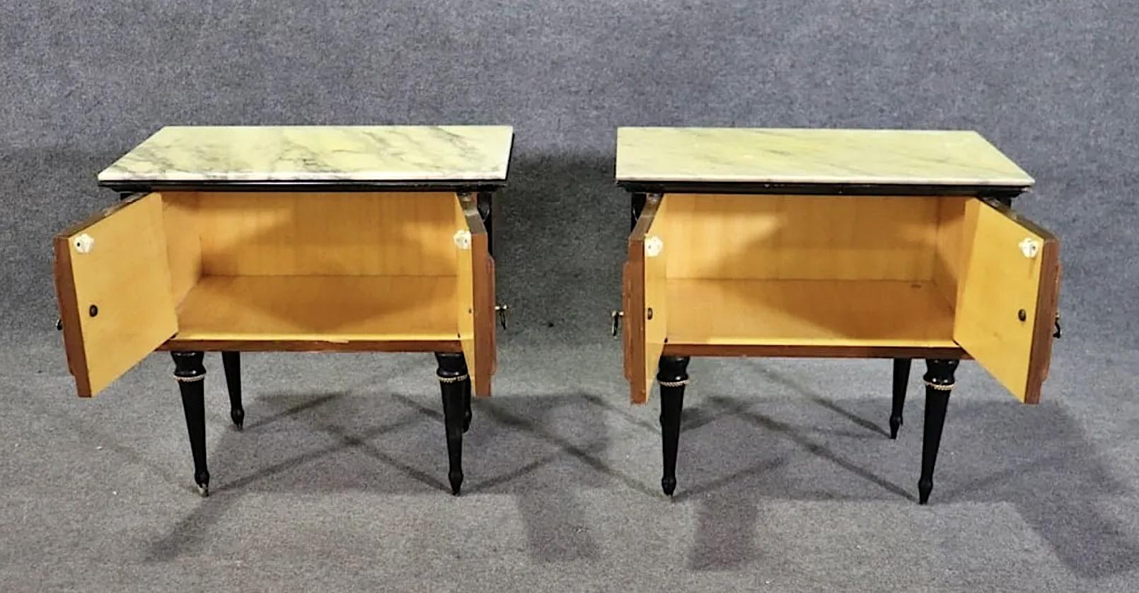 Pair of Italian made tables with marble tops and two door cabinet storage. Burled wood front and ebonized legs and trim. Great for living room or bedside.
Please confirm location NY or NJ