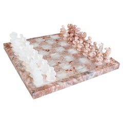 Ensemble d'échecs italien en pierre de quartz rose et blanc marbré 