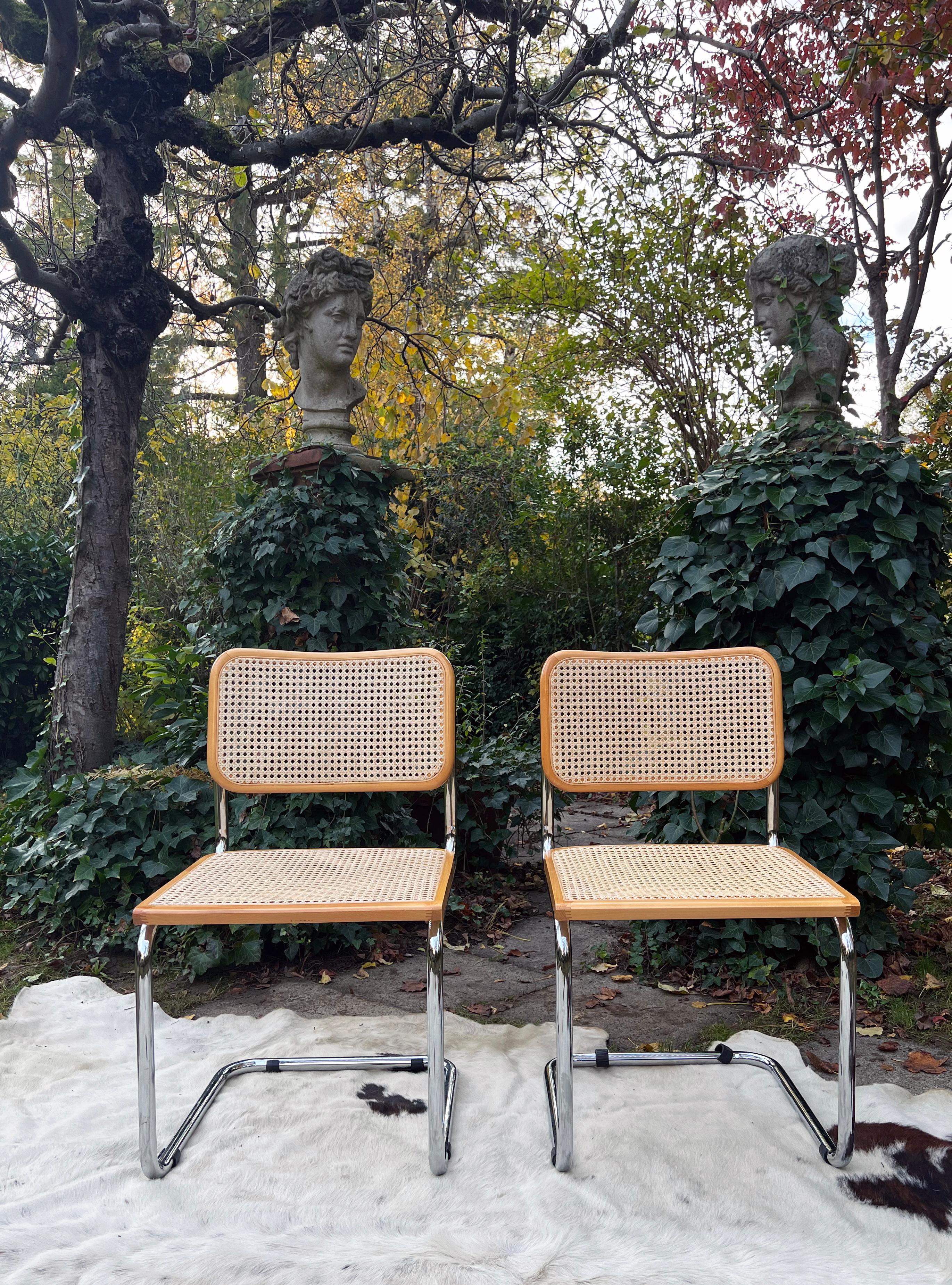 A beautiful set of 6 original Italian Breuer Cesca chairs with Wood framed seat and back with birds eye cane and a chrome plated metal frame. This set is in beautiful condition, all marked 