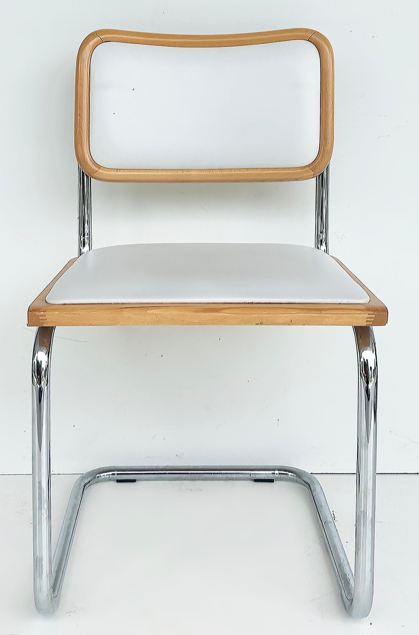 Juego de 6 sillas de comedor italianas Cesca de Marcel Breuer en cromo, madera y cuero 

Se ofrece a la venta un juego de seis sillas de comedor 