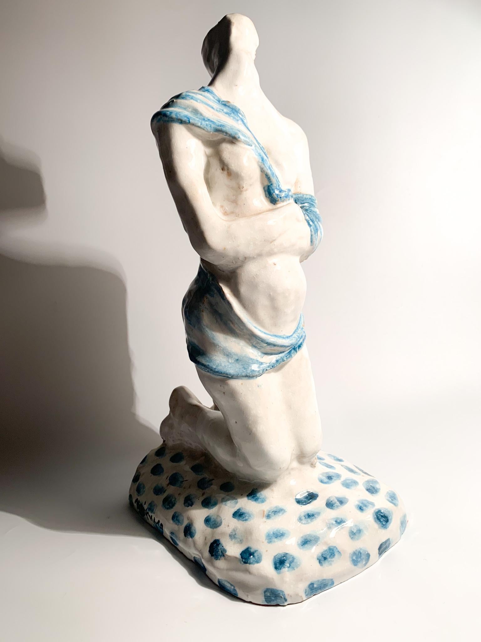 Ceramic sculpture by Giuseppe Migneco, depicting Maternity and made in the 1960s

Measures: Ø cm 18 Ø cm 12 h cm 32

Giuseppe Migneco was born in Messina in 1903, and moved to Milan in 1931 to undertake medical studies. 

During his studies he