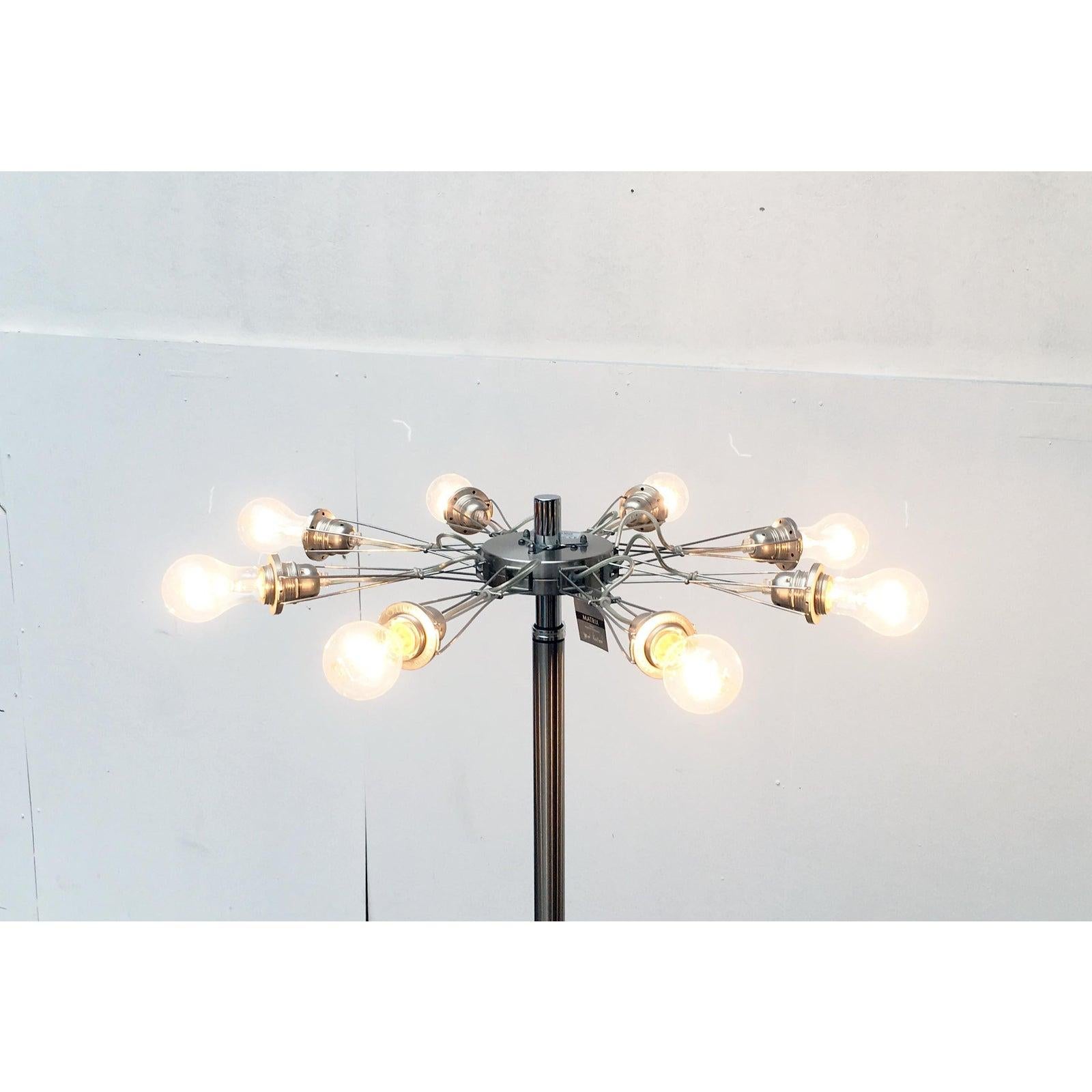 Rare floor lamp version of lumina matrix, which has not been produced for some time and is accordingly rare.

lumina's matrix, designed by yaacov kaufmann, can be described as a contemporary chandelier. A combination of the brilliance of a