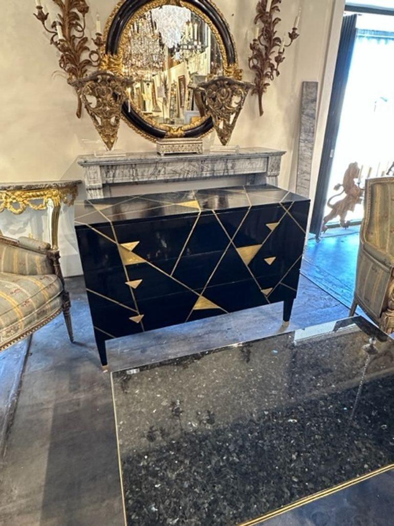 Italian MCM design piano black and inlaid brass chest. Circa 2000. Perfect for today's transitional designs!