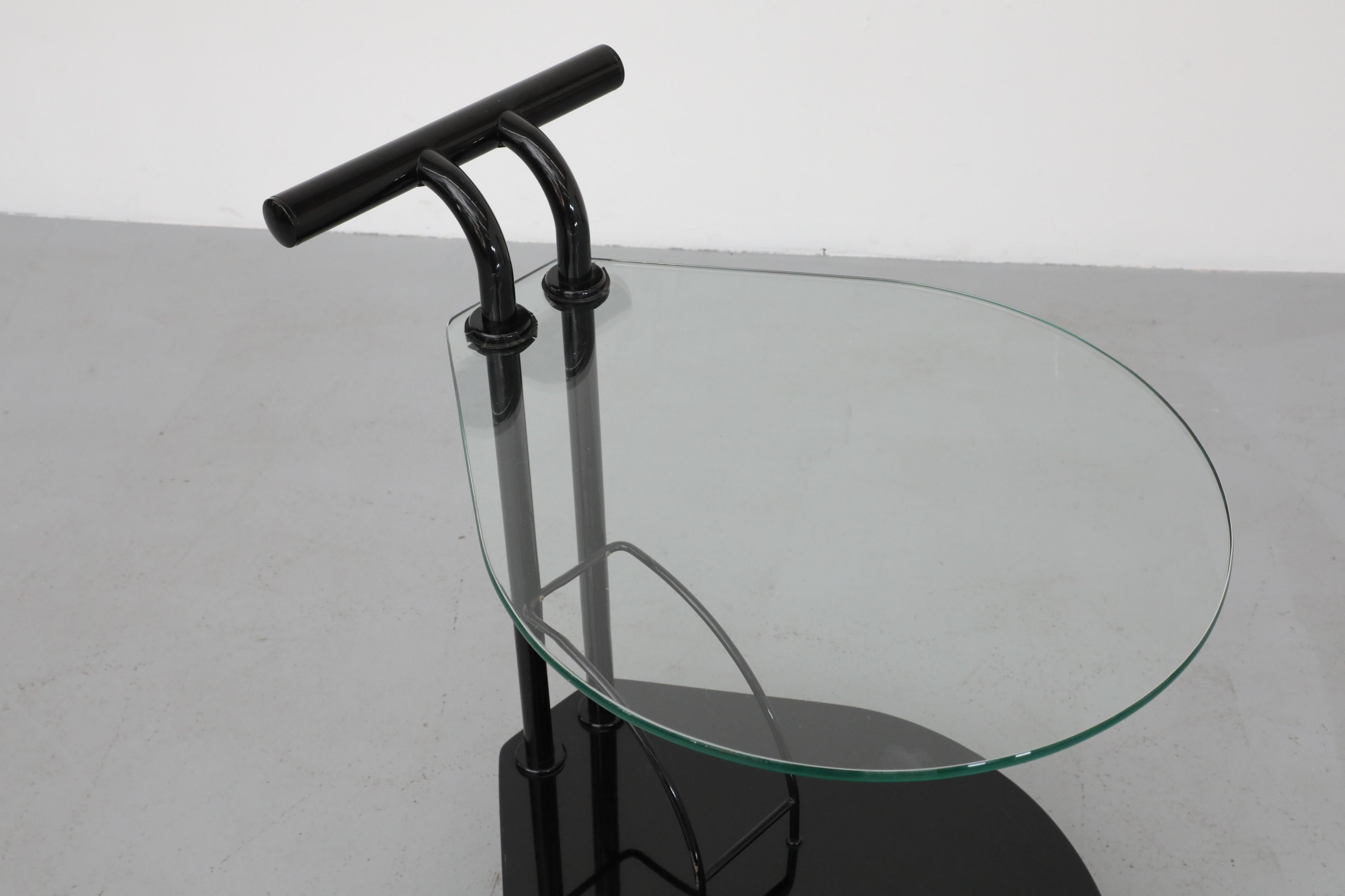Italian Memphis Style Two Tiered Rolling Bar Cart with Black Frame and Glass Top For Sale 3