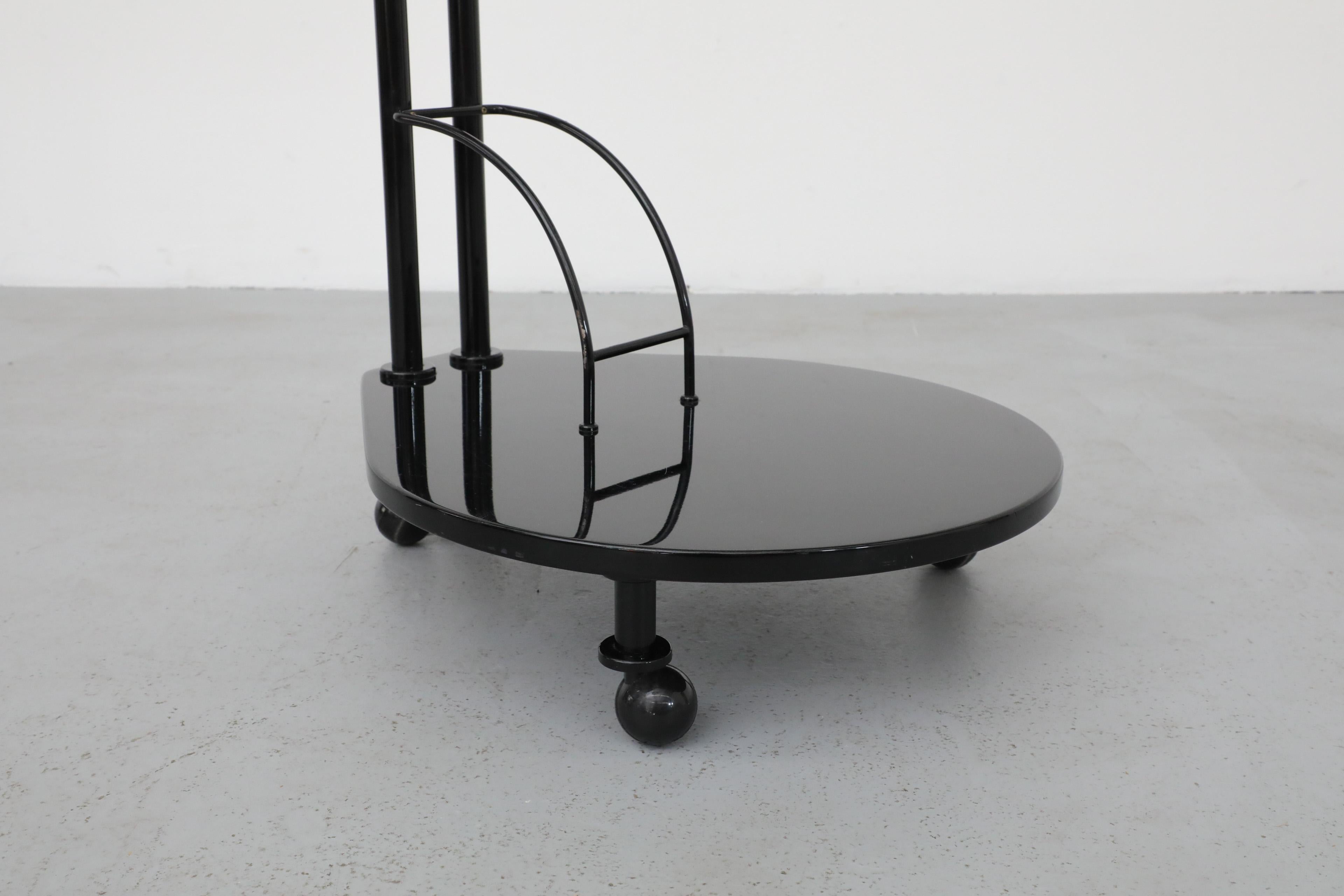 Italian Memphis Style Two Tiered Rolling Bar Cart with Black Frame and Glass Top For Sale 4