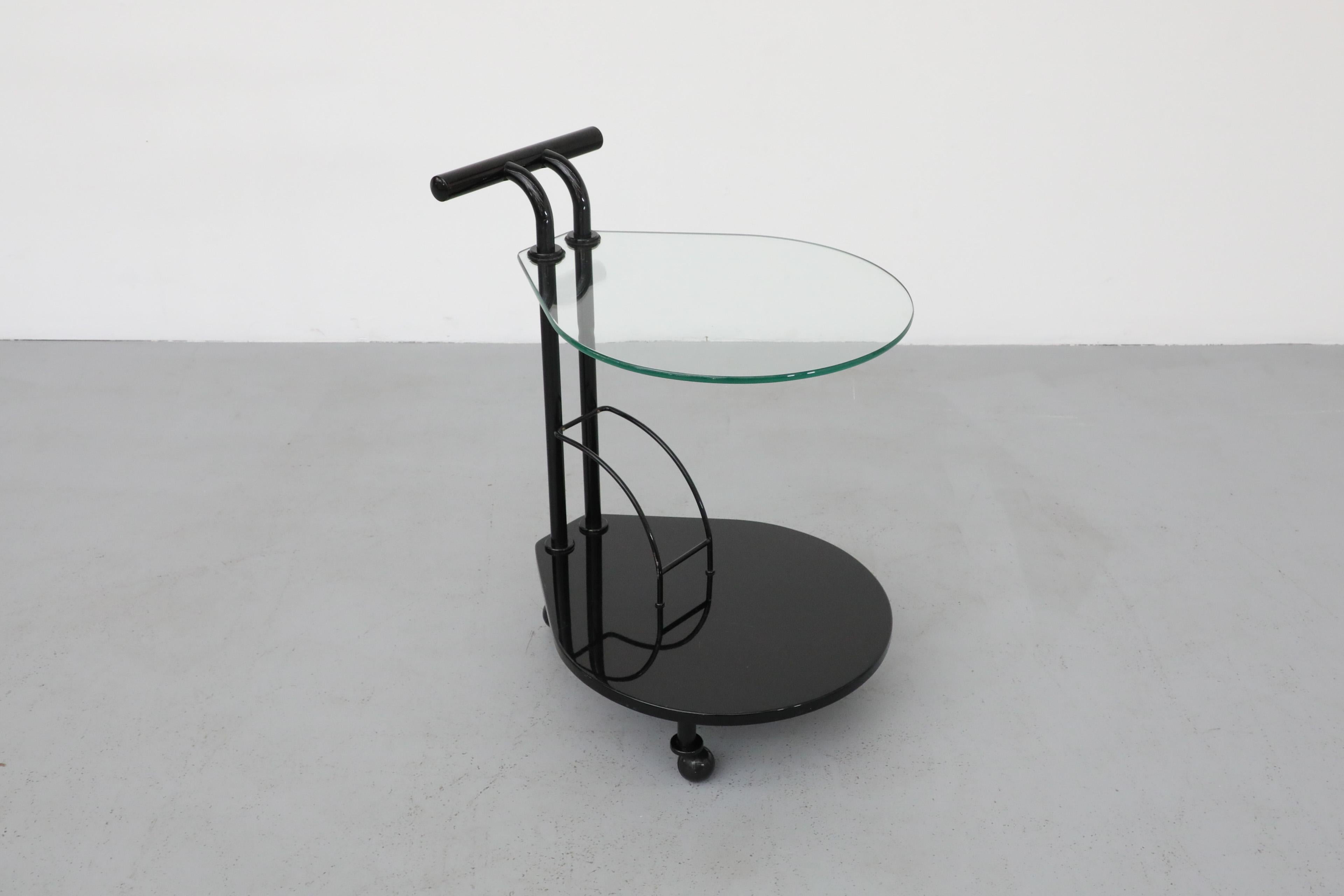 Italian Memphis Style Two Tiered Rolling Bar Cart with Black Frame and Glass Top For Sale 2