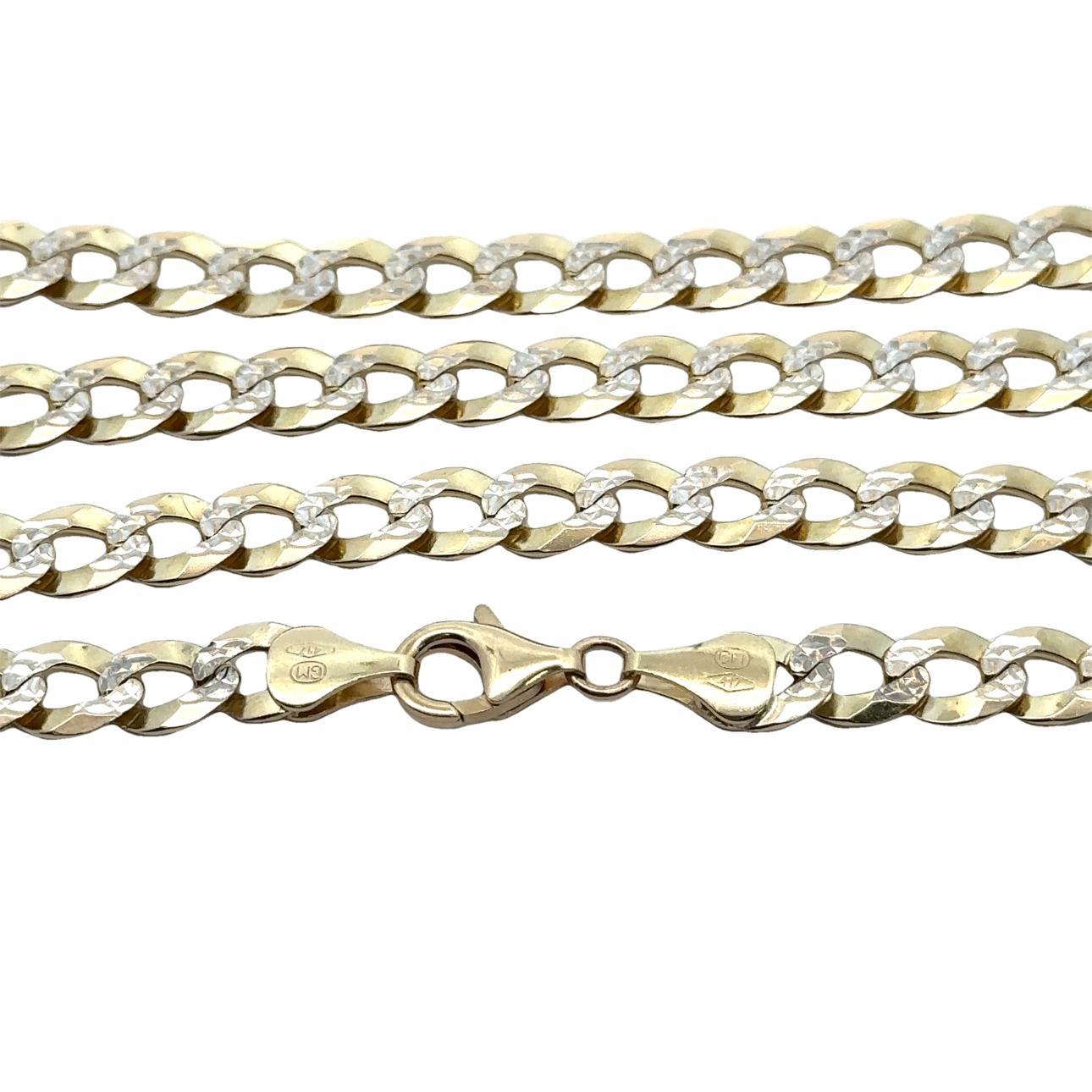 Material: Solid 10k Yellow Gold w/ White Gold Accents
Weight: 27.57 Grams
Chain Length: 26