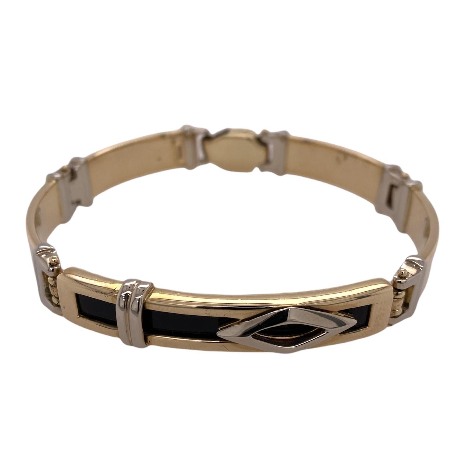 Modernes italienisches Herrenarmband aus 14-karätigem Gelbgold mit Onyx als Schmuckstein. Das Armband misst 8,0 Zoll in der Länge und 0,40 Zoll in der Breite. 