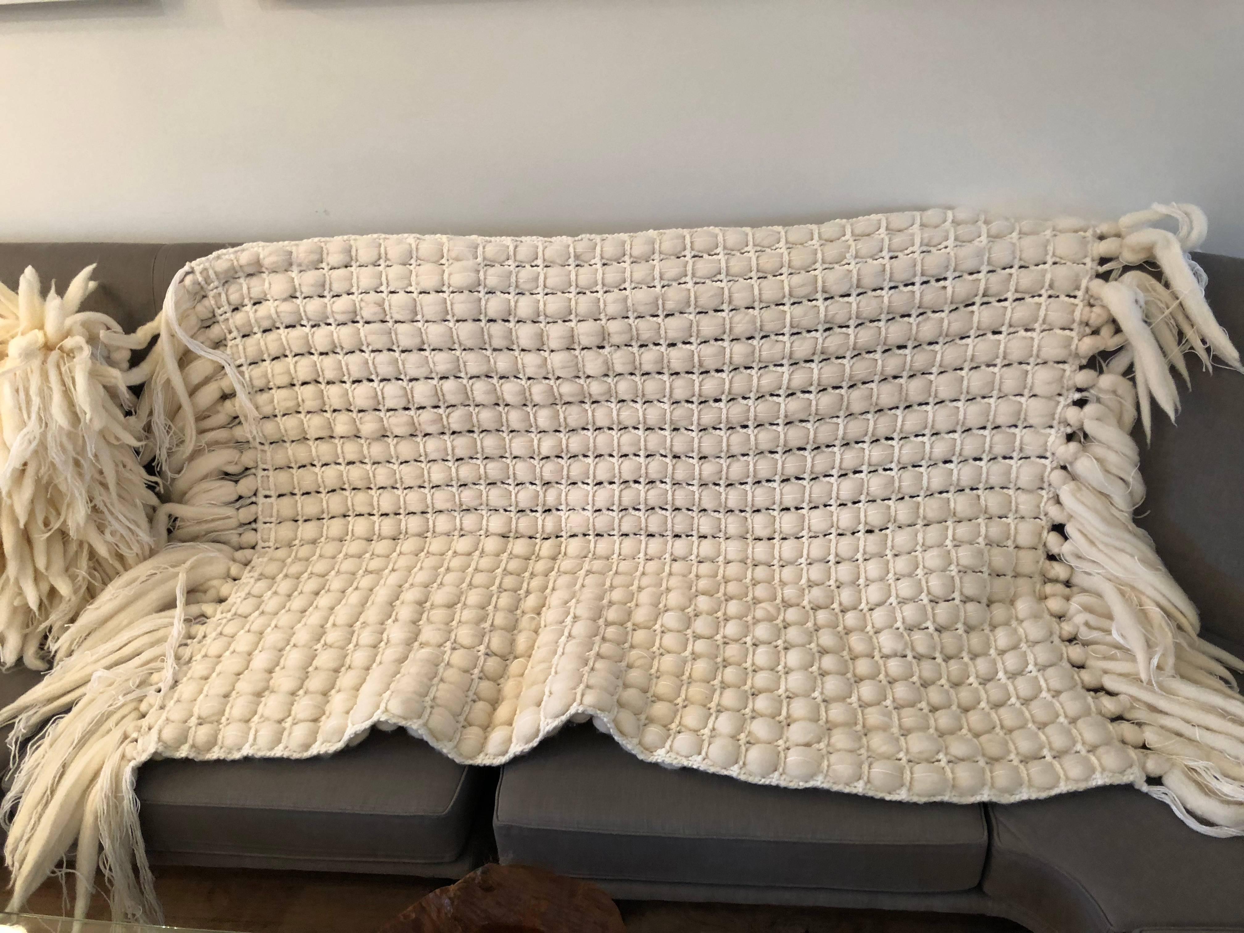 Handwoven, hand-knotted and tufted Italian Merino Wool Throw with knotted fringe border at top and bottom. Custom sizes available. Made in Italy.