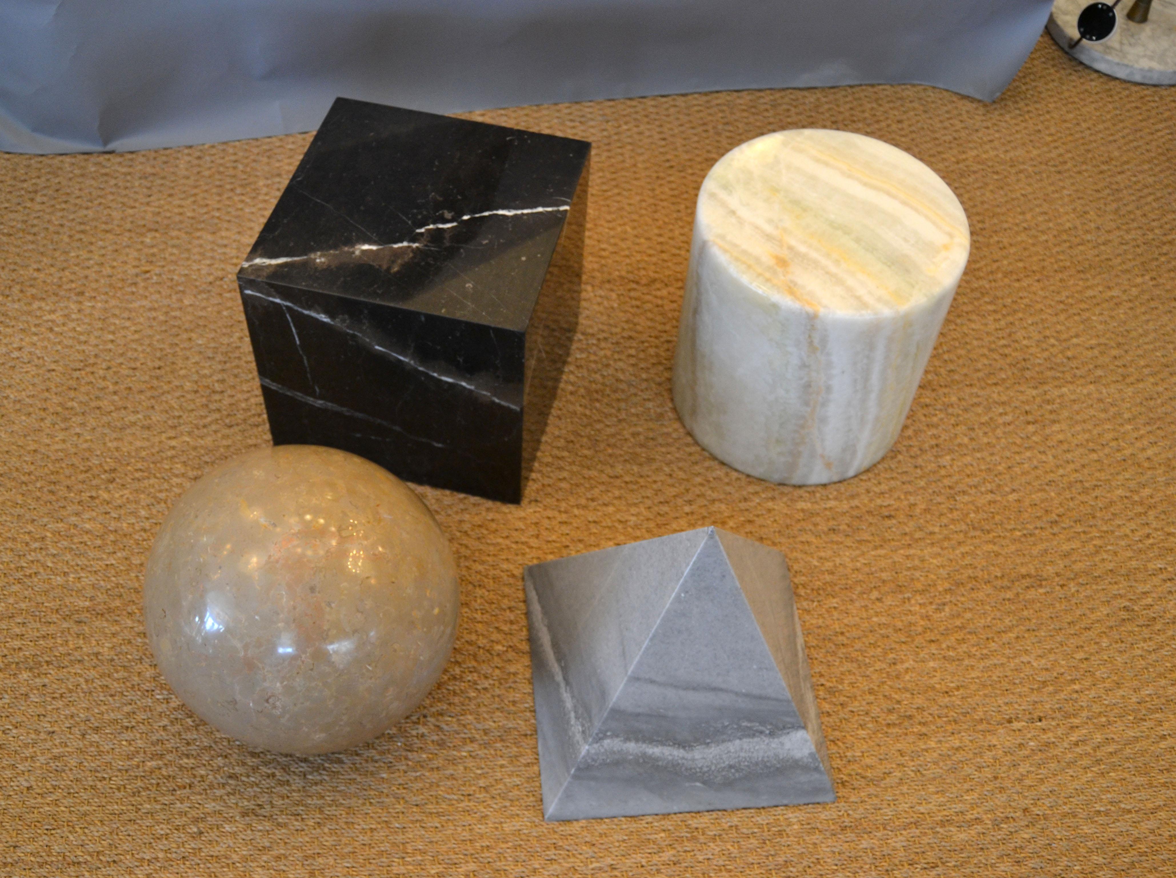 Italian 'Metafora' marble and onyx coffee table base by Lella and Massimo Vignelli for Martinelli Luce.
The four geometric shapes, a cube, a cylinder, a sphere and a pyramid are made out of marble and onyx.
Made in Italy, 1970s.
Note: No square