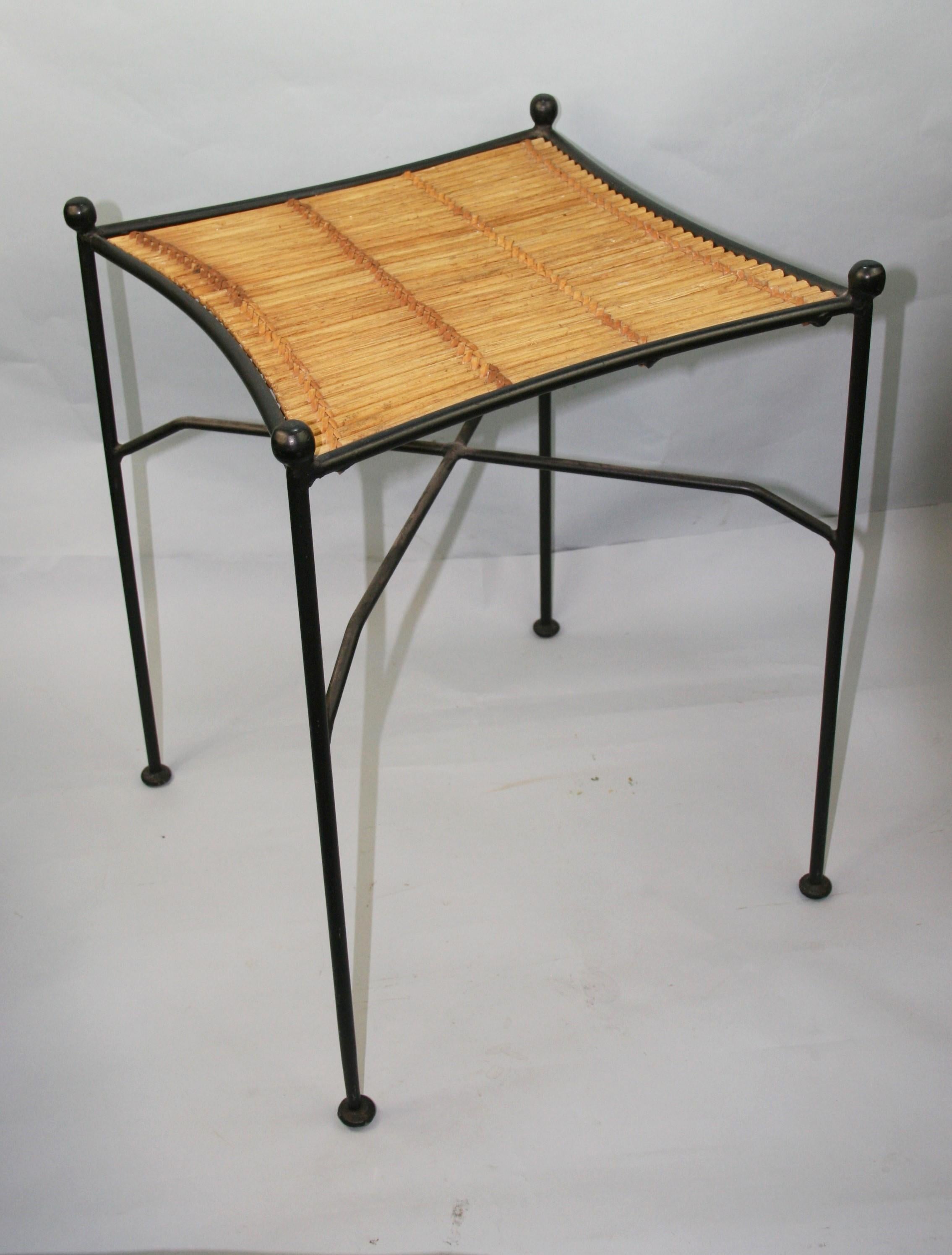 Italian hand made iron table with ball feet and woven willow top.
