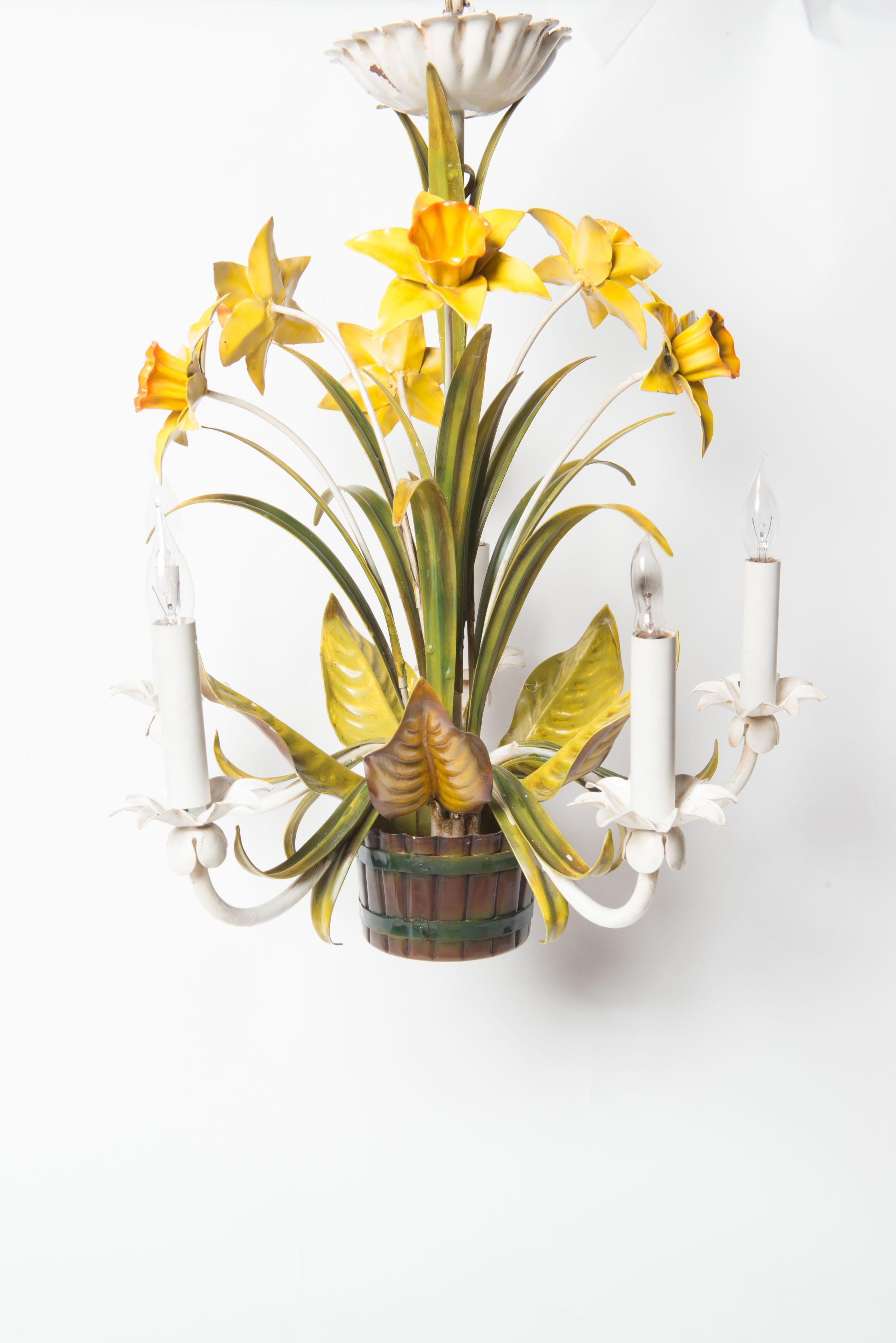 Italian metal floral chandelier with yellow daffodils and large leaves in brown slat and green banded metal basket. All original paint in good condition. Five arm chandelier with five sockets for chandelier bulbs. Original canopy included.