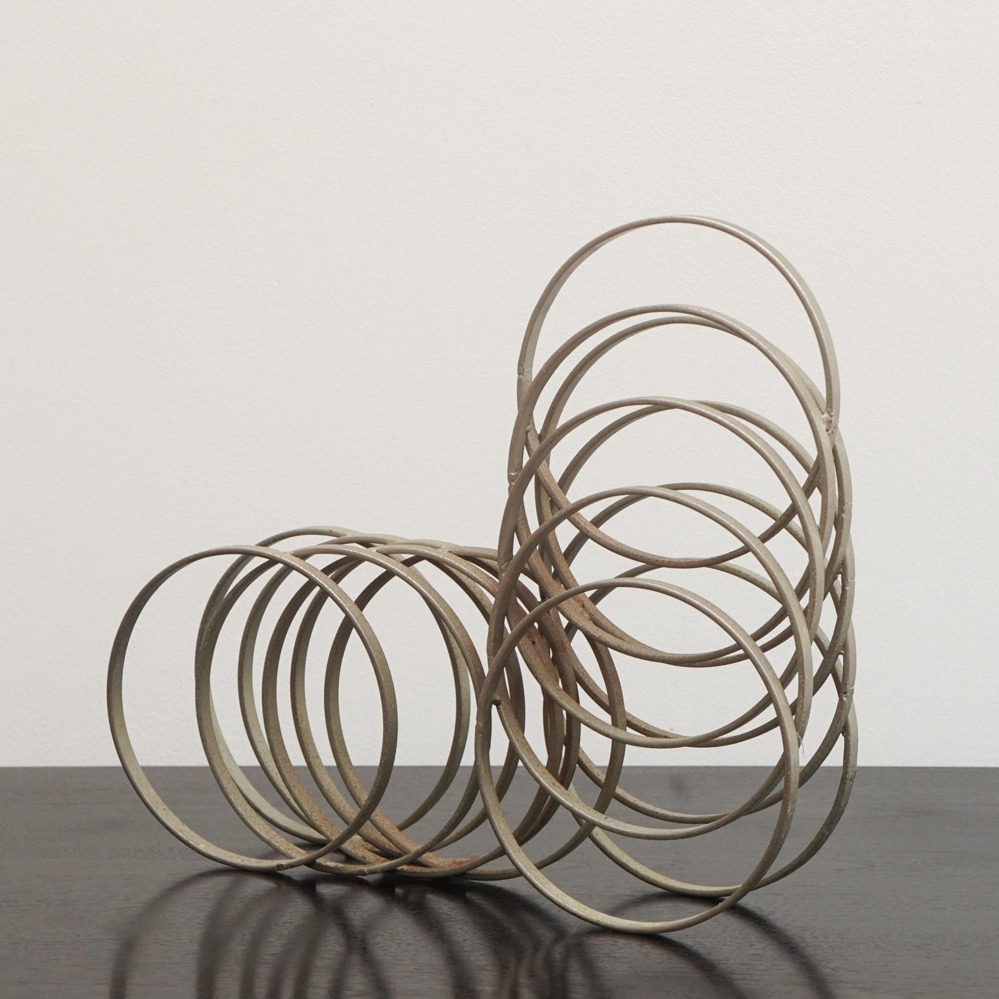 Hand-Crafted Italian Metal Rings Sculpture For Sale