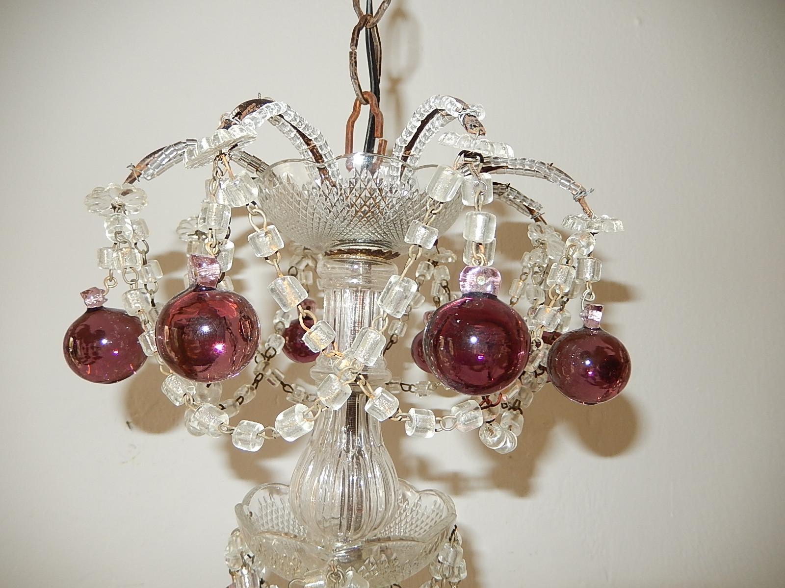 Housing 3 lights in center. Will be-wired with appropriate sockets for country and ready to hang. Murano blown center, top and bottom is completely beaded. Macaroni swags with Murano amethyst balls. Free priority UPS shipping from Italy with no