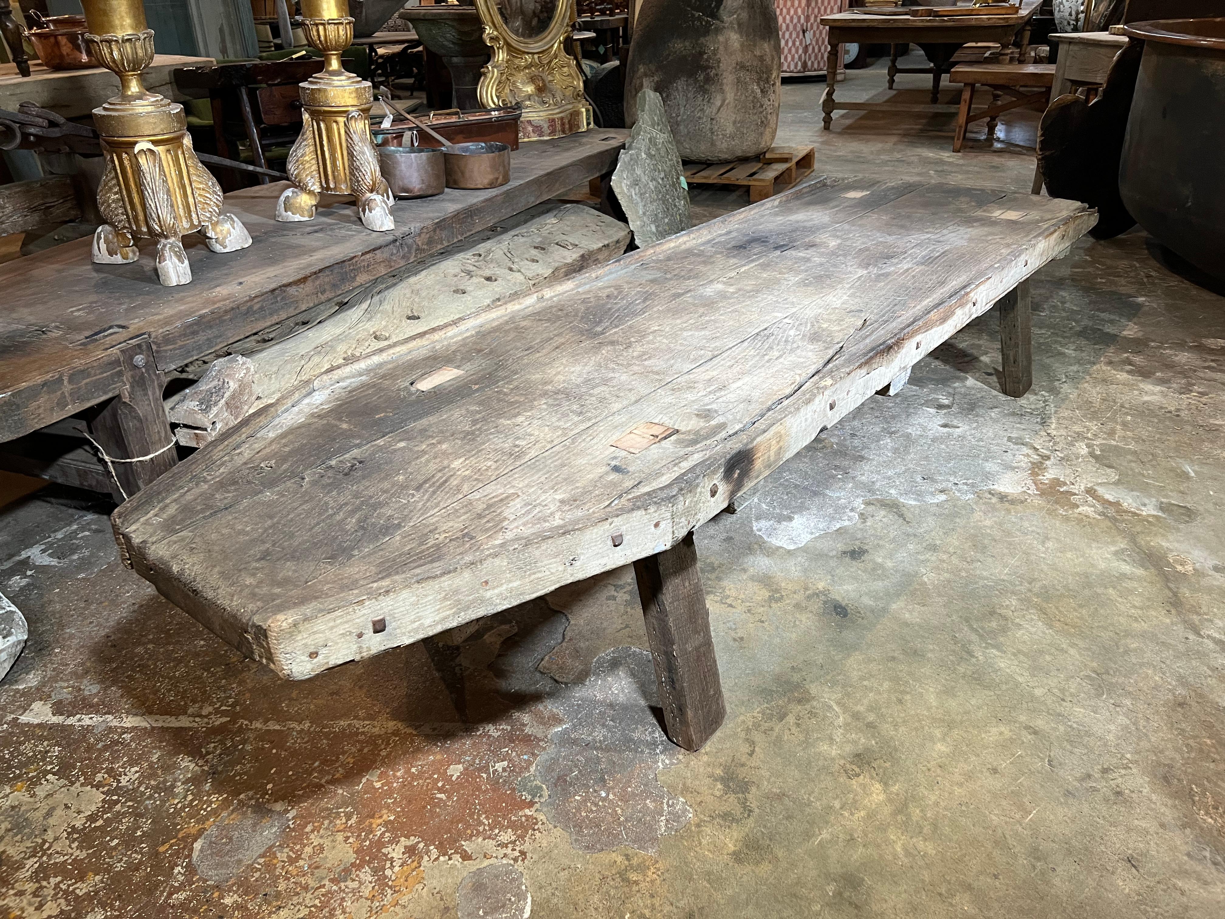 A terrific mid-19th century grand scale Cheese board table - originally used in making cheese. Perfect as a table basse - coffee table. Sturdily constructed from pine. A great addition to any modern or rustic environment.
