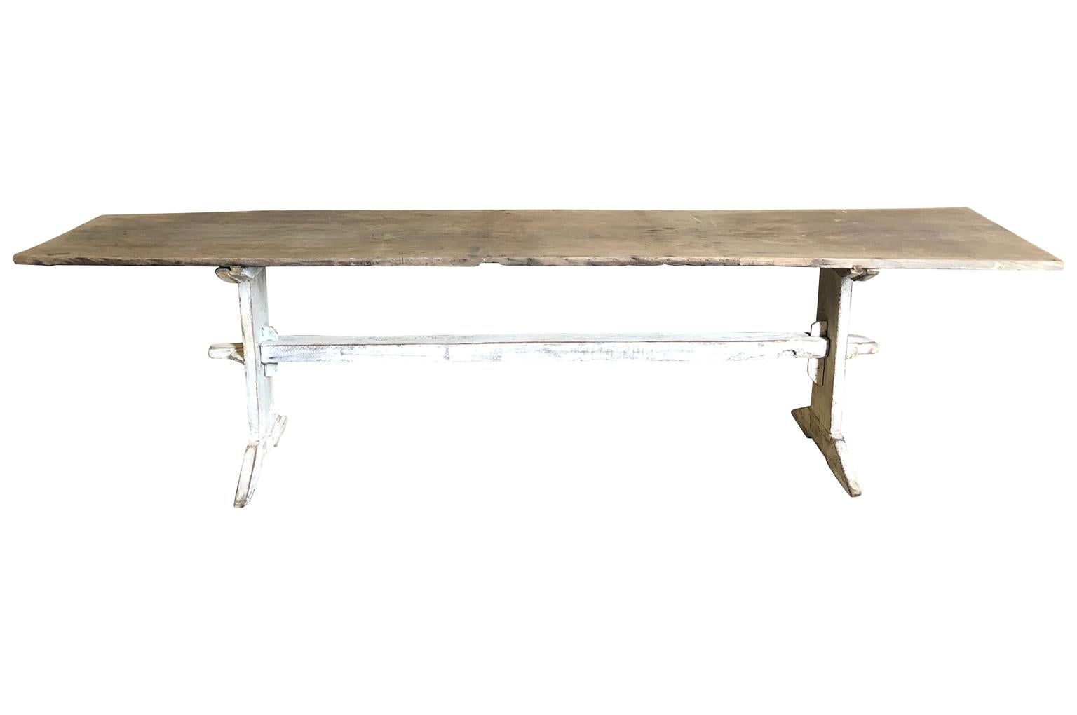 A very handsome primitive console table from Northern Italy. Soundly constructed from oak with a naturally washed top and painted base. Terrific patina.