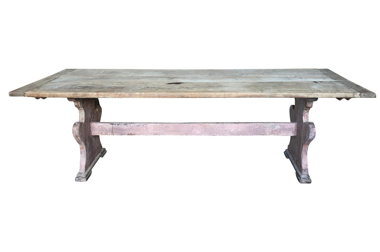 A very beautiful mid-19th century monastery table, trestle table from the Veneto region of Italy. Beautifully and soundly constructed from in washed and painted wood. Wonderful patina and finish.