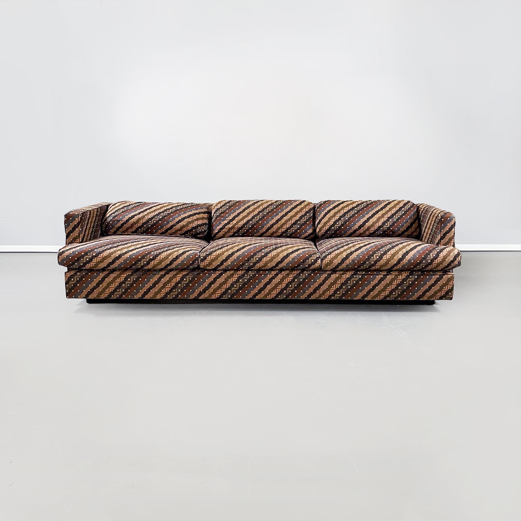 Italian mid-century 3 seat sofa with Missoni fabric by Saporiti Italia, 1980s
The sofa upholstered and covered in Missoni's fabric with colorful stripe and square patterns. The sofa has 3 seats with rectangular seats and back cushions. It has