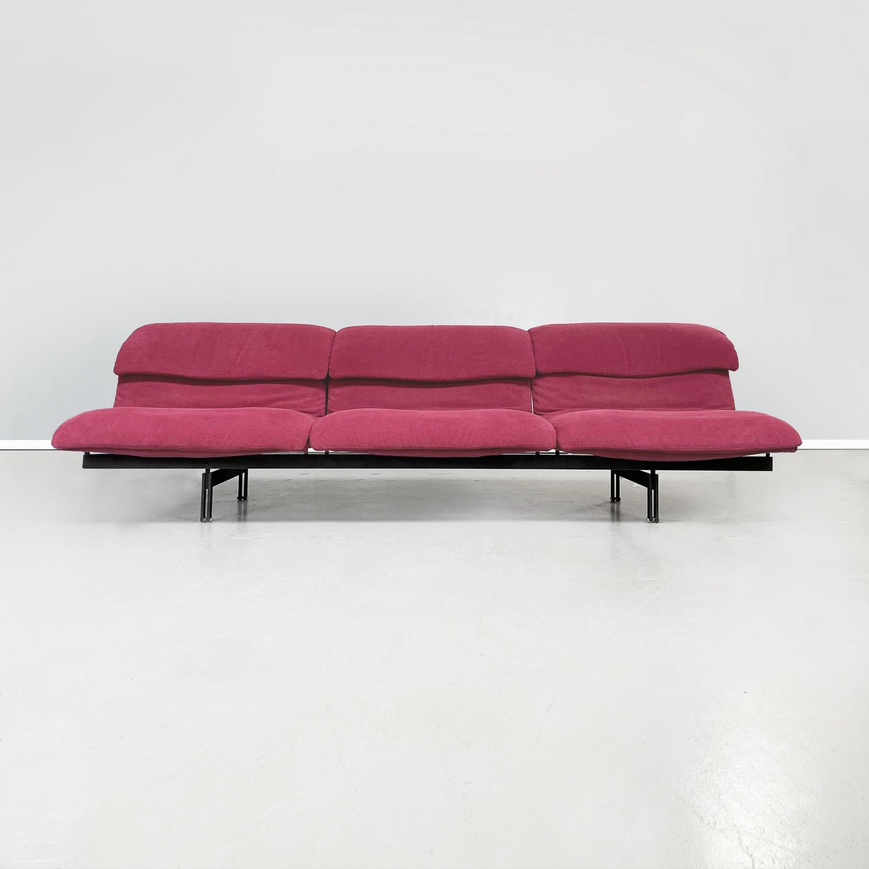 Italian mid-century 3 seater sofa Wave by Giovanni Offredi for Saporiti, 1970s
Three seater sofa mod. Wave with rectangular seat. The seat and back are made up of curved cushions, padded and upholstered in red / purple fabric. The structure is made