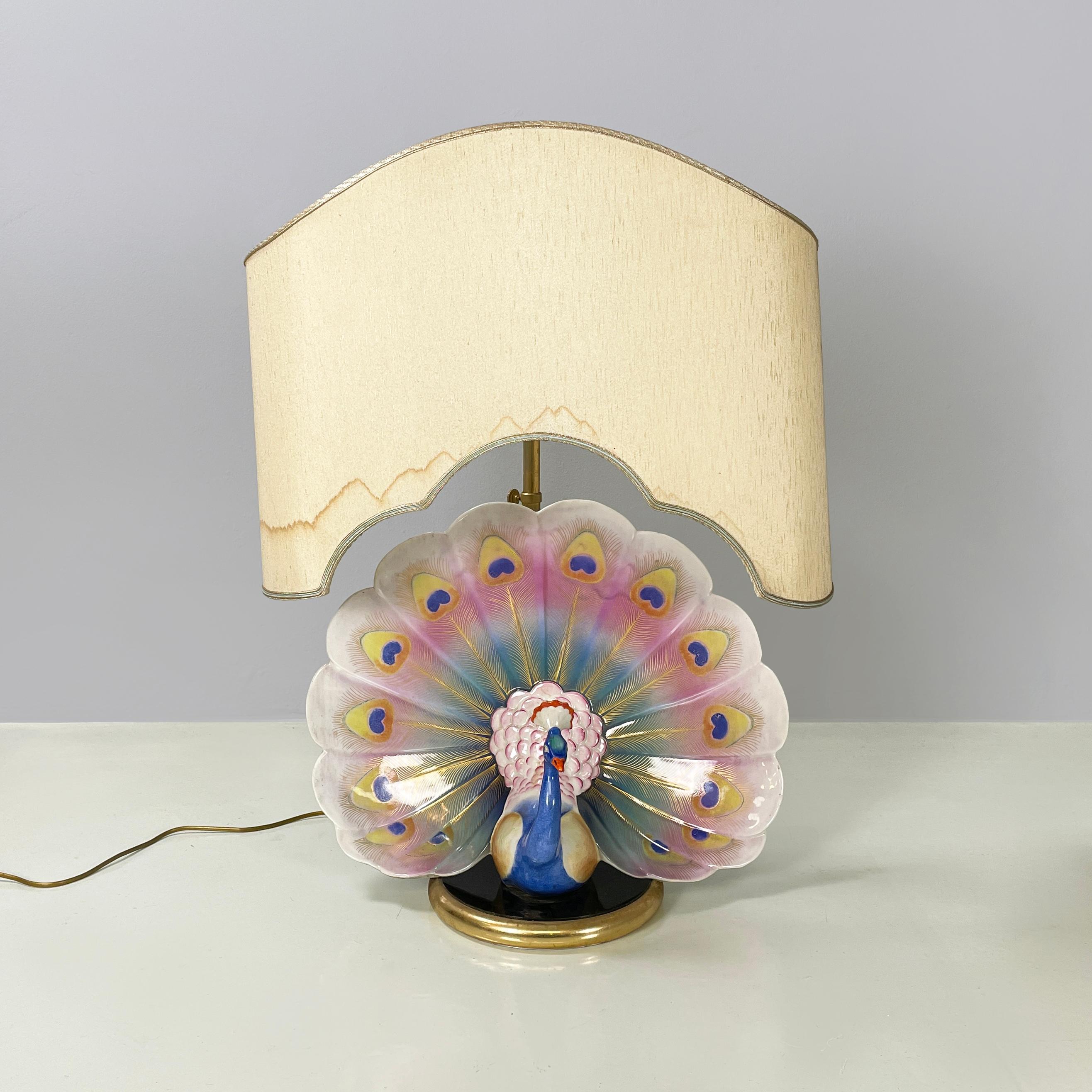 Mid-Century Modern Italian mid-century Adjustable table lamp with peacock in ceramic brass, 1970s For Sale
