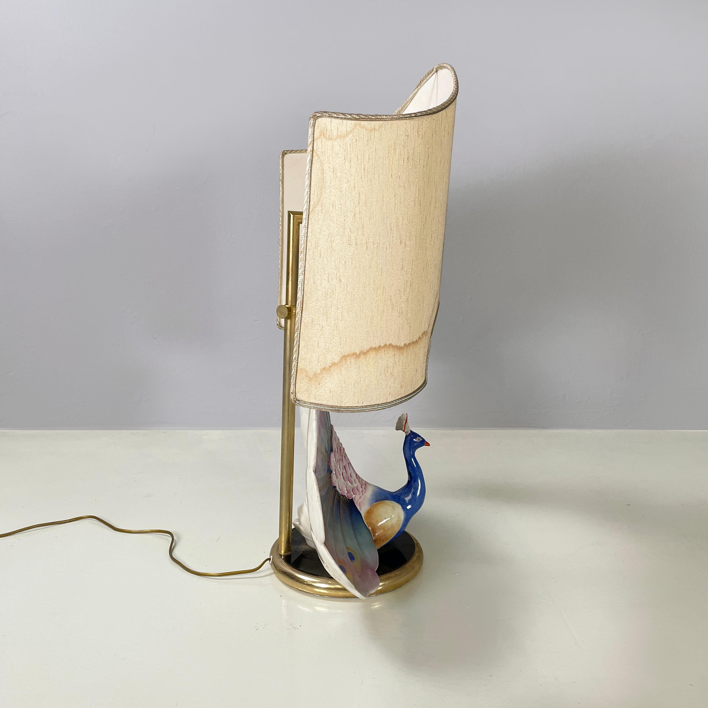 Late 20th Century Italian mid-century Adjustable table lamp with peacock in ceramic brass, 1970s For Sale