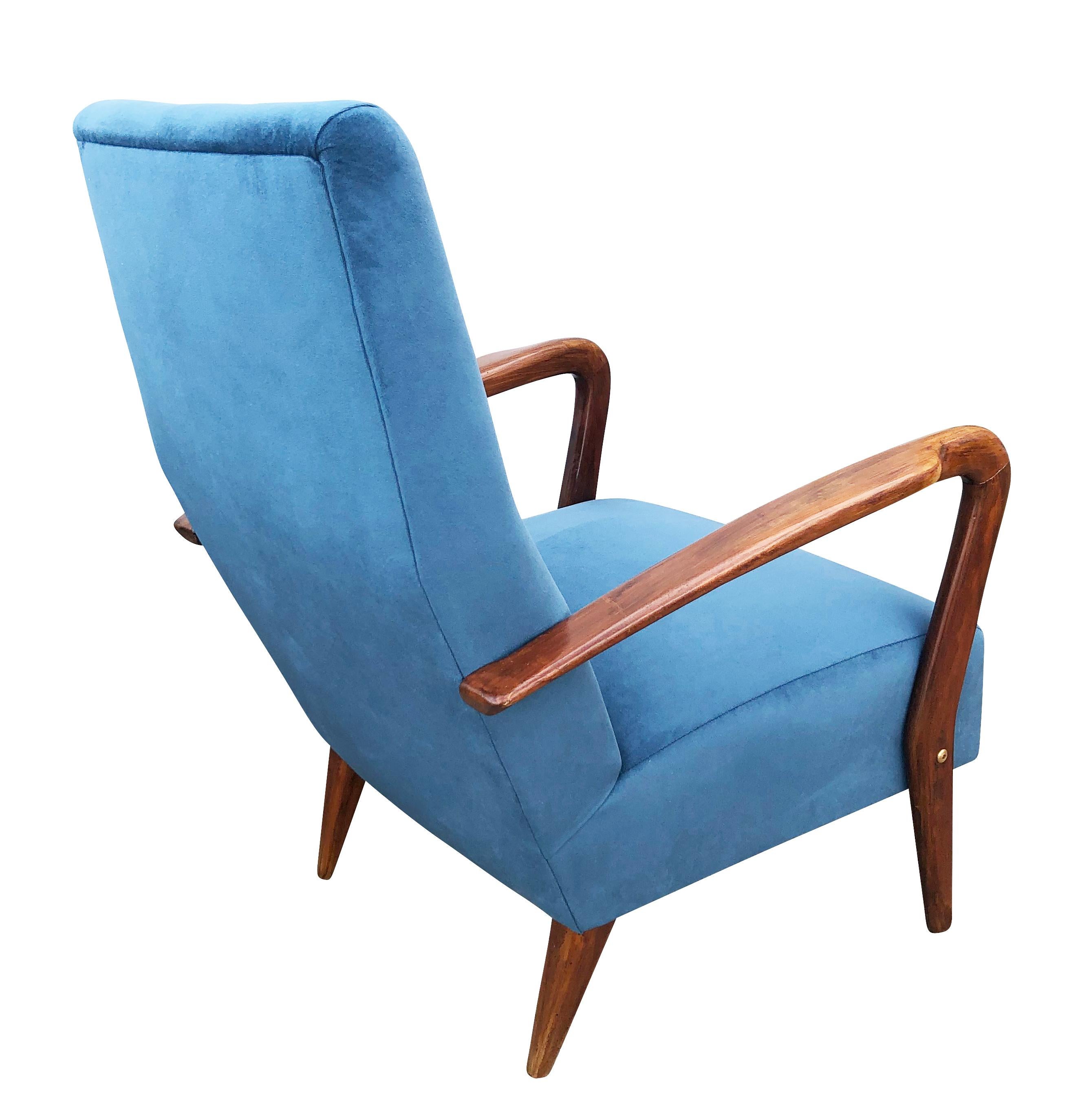 Italian midcentury lounge chair reminiscent of the style of Gio Ponti with wood armrests and legs. Recovered in a blue velvet.

Condition: Minor wear consistent with age and use. Recently recovered.

Measures: Width 26”

Depth 26”

Height