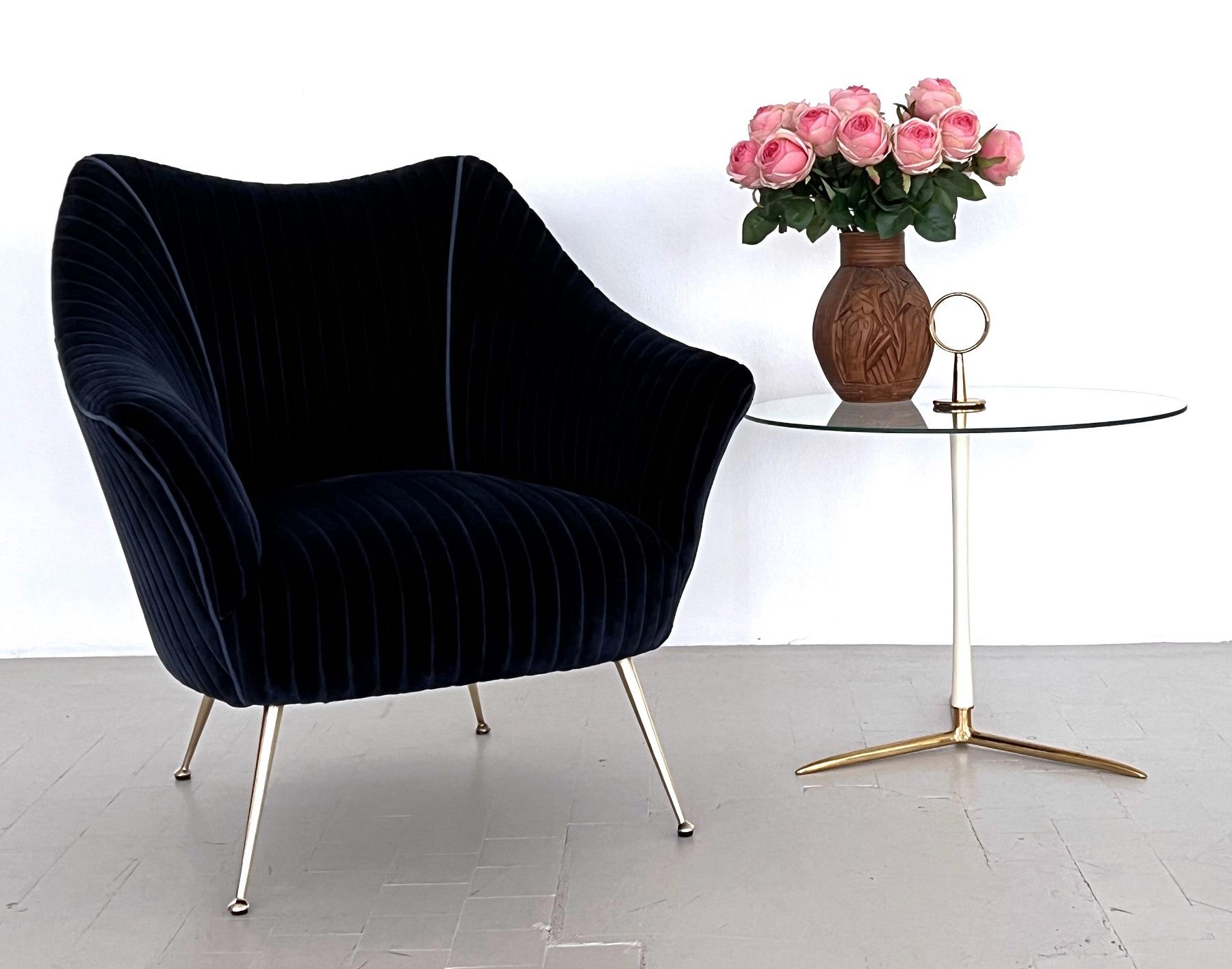 Magnificent comfortable single armchair re-upholstered in gorgeous, very thick and soft night-blue velvet. The velvet has a large striped design, which is felt by touch.
The original armchair is from the 1950s, and re-upholstered from scratch with