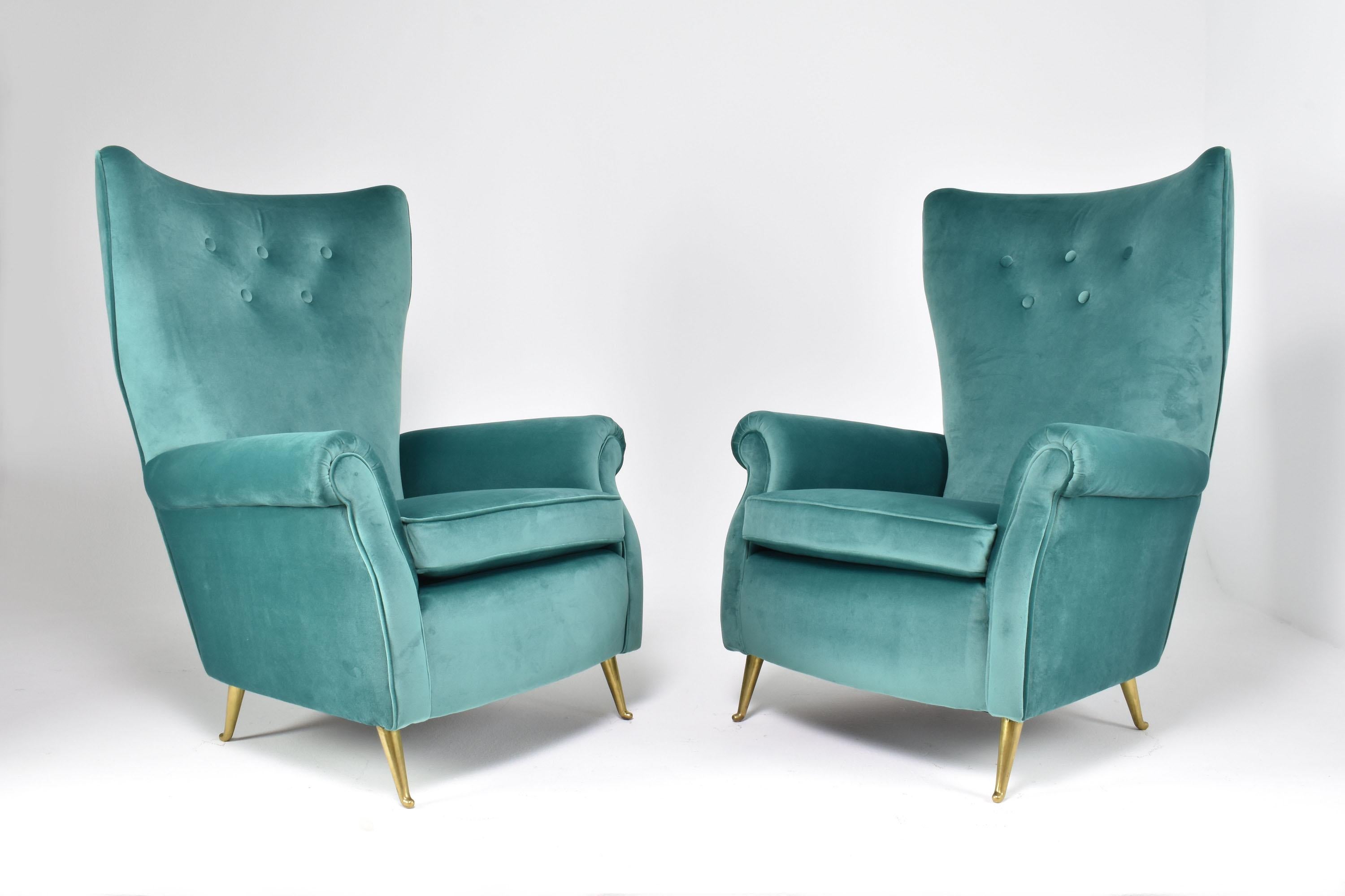 ISA Bergamo is a renowned Italian furniture manufacturer of the 20th century known for its exceptional craftsmanship and dedication to producing high-quality pieces. This pair of 20th-century vintage Italian club armchairs are a testament to the