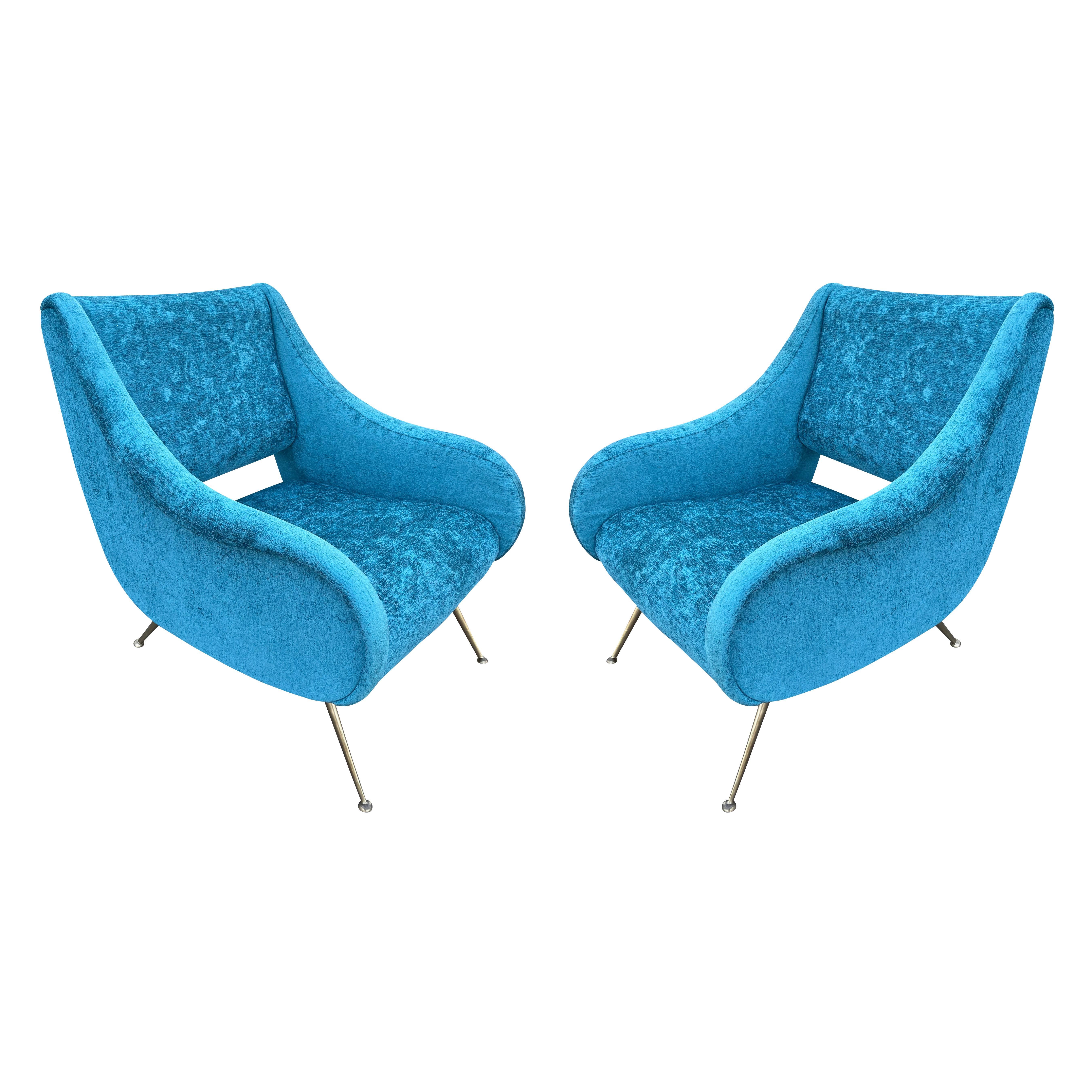 Italian midcentury armchairs in the style of Gio Ponti
$6,900.00
Chic Italian midcentury armchairs in the style of Gio Ponti with a slit back and tapering brass legs.

Recovered in a blue velvet. Price for the pair-sold individually on