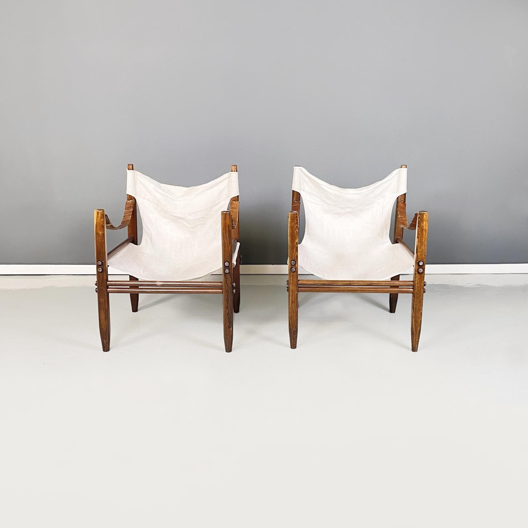 Italian midcentury armchairs Oasi 85 by Gian Franco Legler for Zanotta, 1960s
Pair of armchairs mod. Oasi 85, also known as Safari, in beige fabric and wood. The seat and backrest are composed of a single fabric, fixed to the structure. The