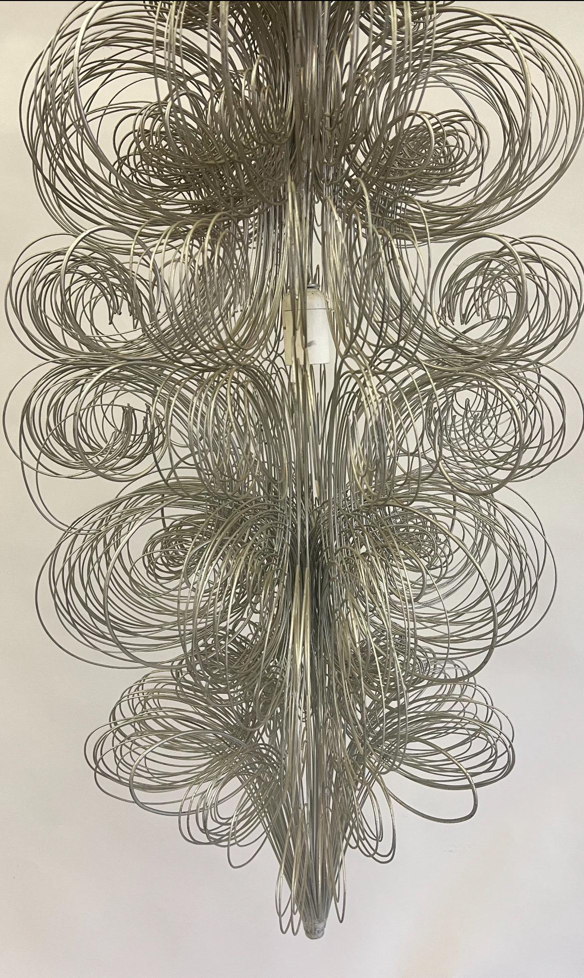 2 Rare, Original Artist Made Hanging Lighted Sculptures / Chandeliers / Pendants in the style of Jannis Kounellis, Italy, circa 1970.  Priced and Sold as Individual Pieces. These unique Italian Mid-Century Modern pieces are composed of steel wire,