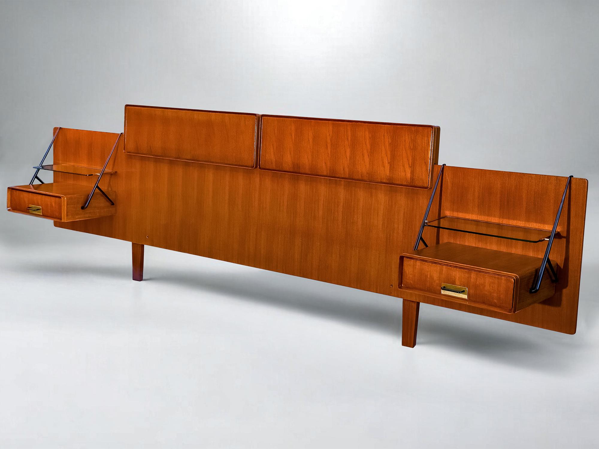 This double bed headboard with the two suspended nightstands are a masterpiece of mid-century Italian design and were designed by Silvio Cavatorta in the 1950s.
All the structures are made of teakwood and are in very good condition of the period as