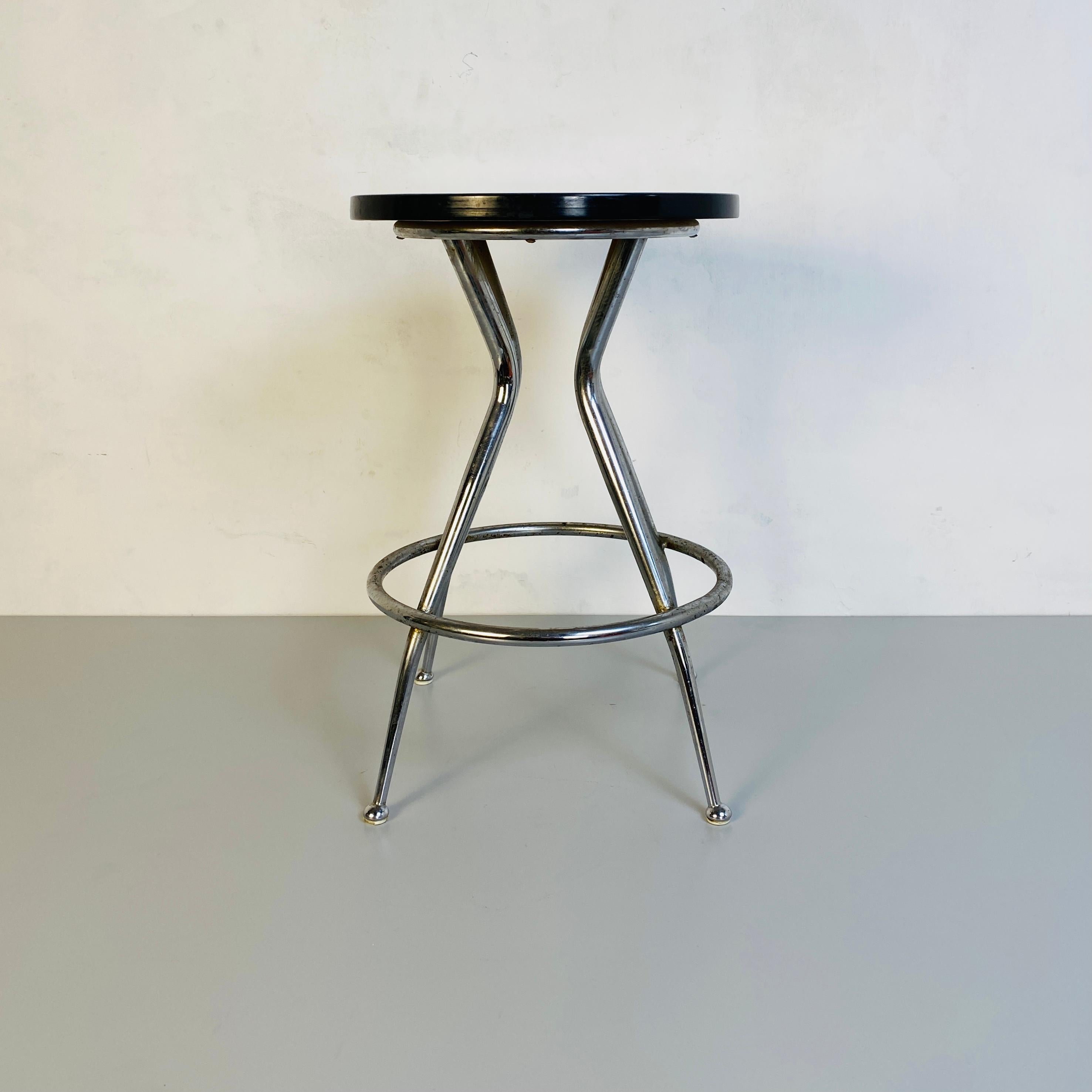 Italian mid-century modern black and chromed stool, 1950s
Black Stool with curved legs in chromed steel and round seat in wood covered in black formica, 1950s.

Good conditions.
Perfect for a kitchen or a breakfast table, this stool can be used near