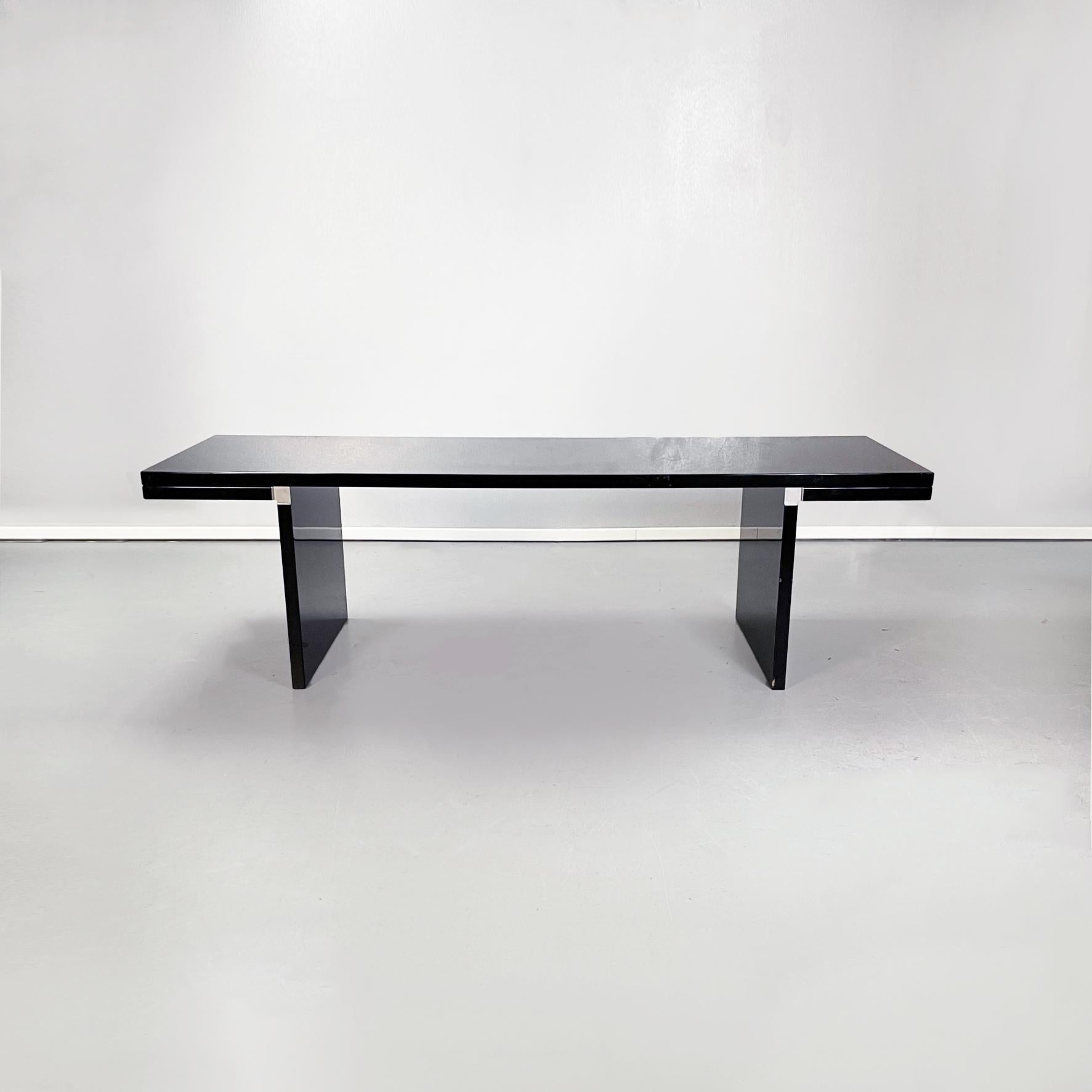 Italian mid-century black wood Orseolo dining table by Scarpa for Gavina, 1970s
Orseolo dining table with rectangular piano in black lacquered wood, like the entire structure. The structure is made by assembling geometric panels elements, in