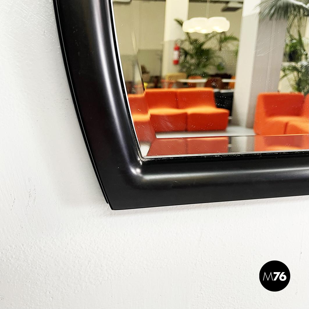 Late 20th Century Italian Mid-Century Black Wooden Semi-Oval Wall Mirror by Pierre Cardin, 1980s