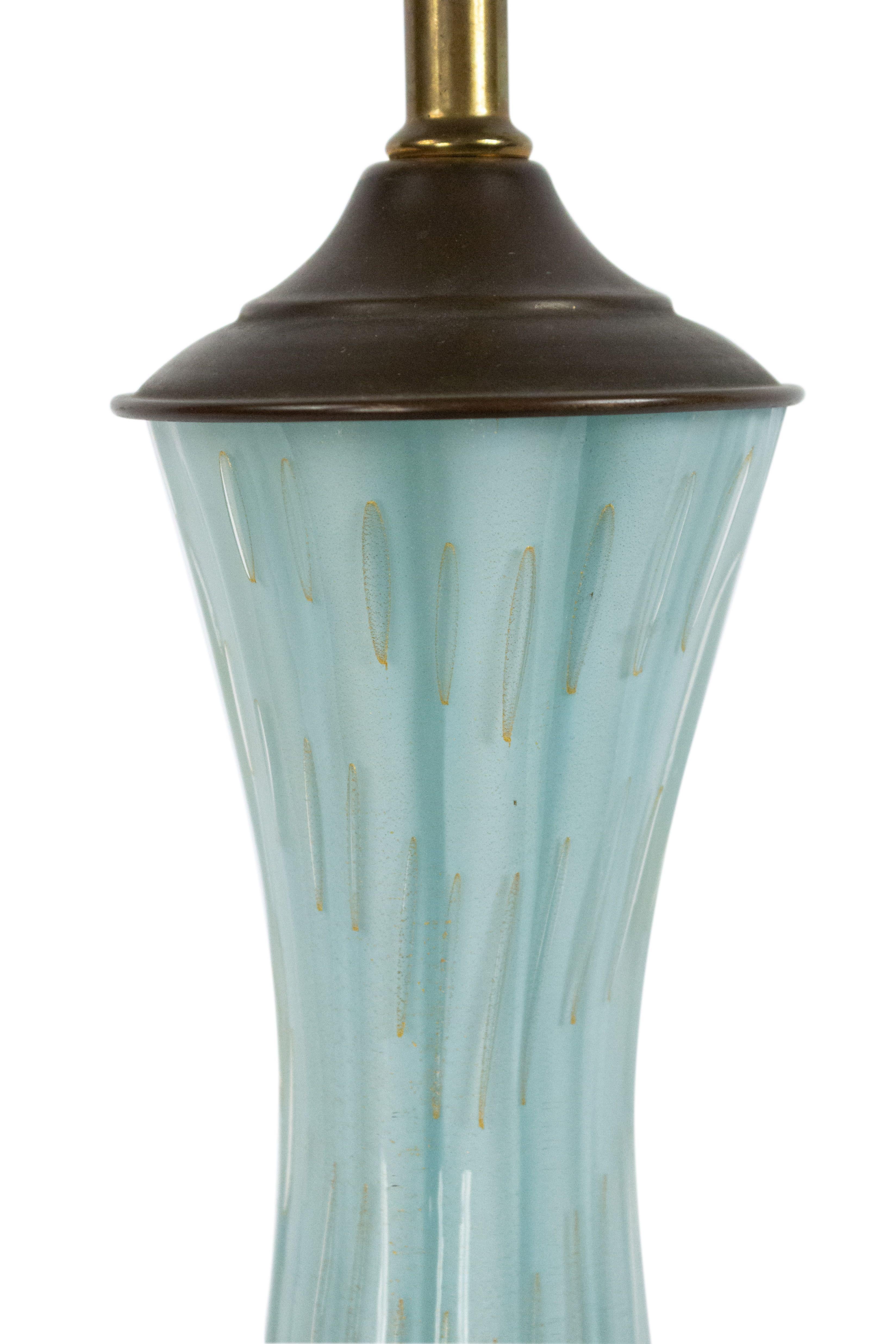 Italian (mid-20th century) blue glass fluted and shaped table lamp with a gold bubble decoration.
