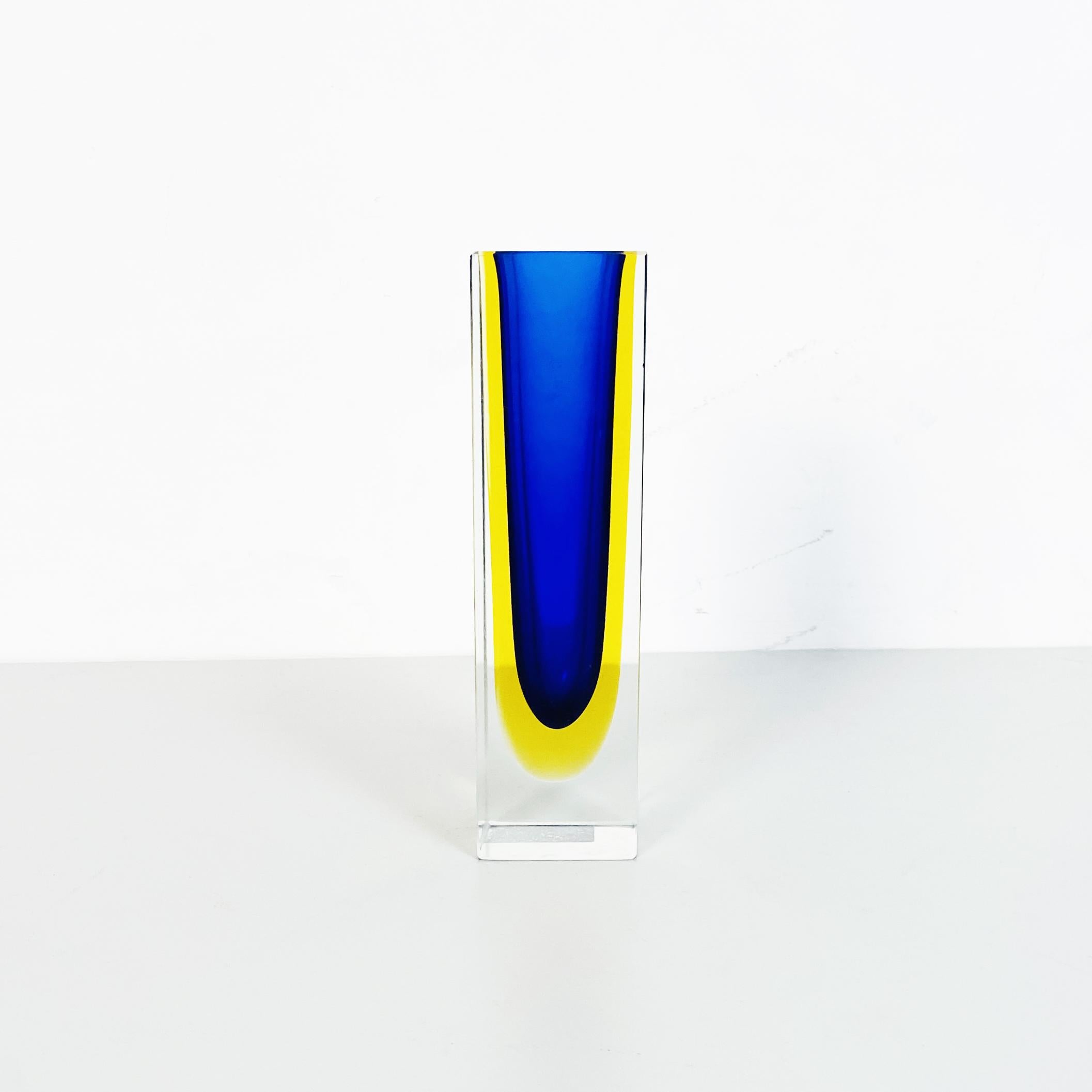 Italian mid-century Blue Murano glass vase with internal yellow shades, 1970s
Blue Murano glass vase with internal yellow shades. From the I Sommersi series.

This Fantastic series of Murano glass vase with various colored shades, is the 