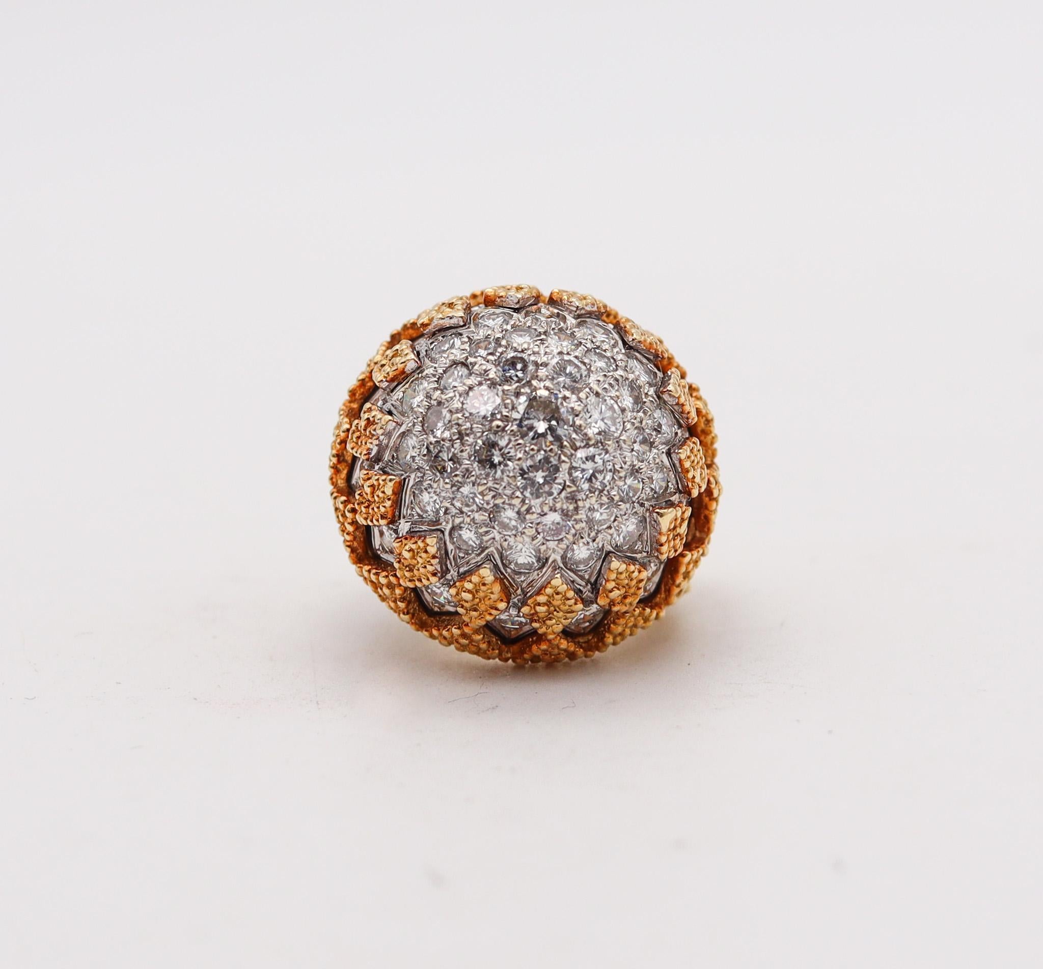 Italian cocktail ring with a pave of diamonds.

Fabulous cocktail ring, created during late the mid-century period, circa 1960. This gorgeous ring has been crafted with a bombe shape in solid yellow gold of 18 karats with high polished finish and a