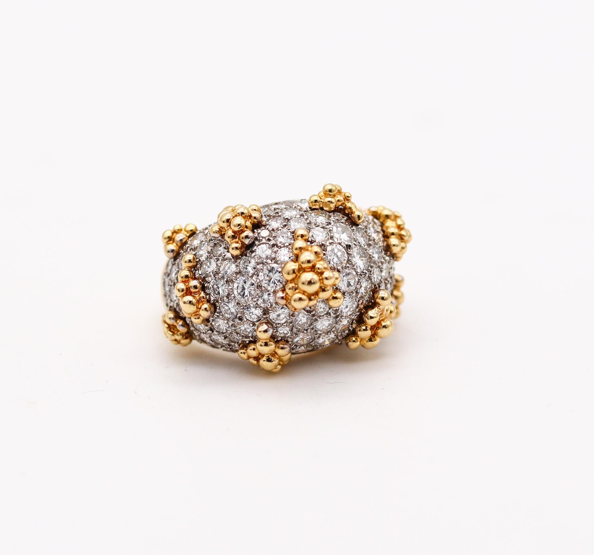 Cocktail ring with a pave of diamonds

Gorgeous cocktail ring, created during the mid-century period, circa late 1960's. This fabulous ring has been crafted with a bombe shape in solid yellow gold of 18 karats with high polished finish and a gallery
