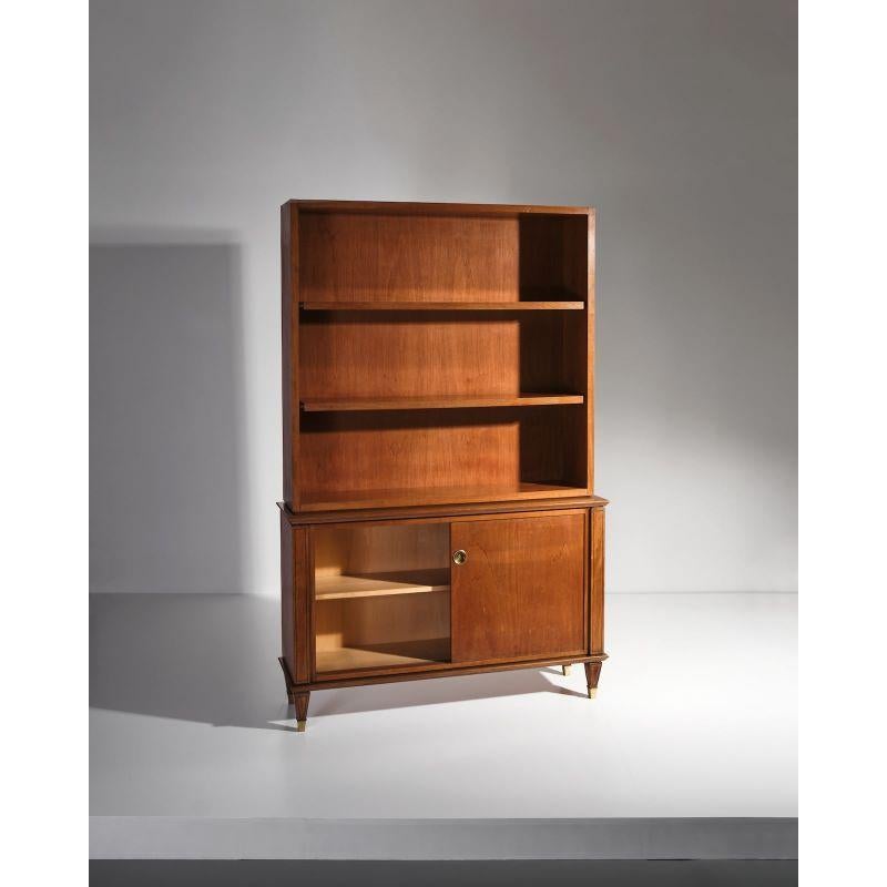 Italian Mid-Century Modern bookcase in wood and brass, attributed to the designer Paolo Buffa, made in circa 1960s.

Dimensions: W 123 x D 34 x H 191 cm.
  