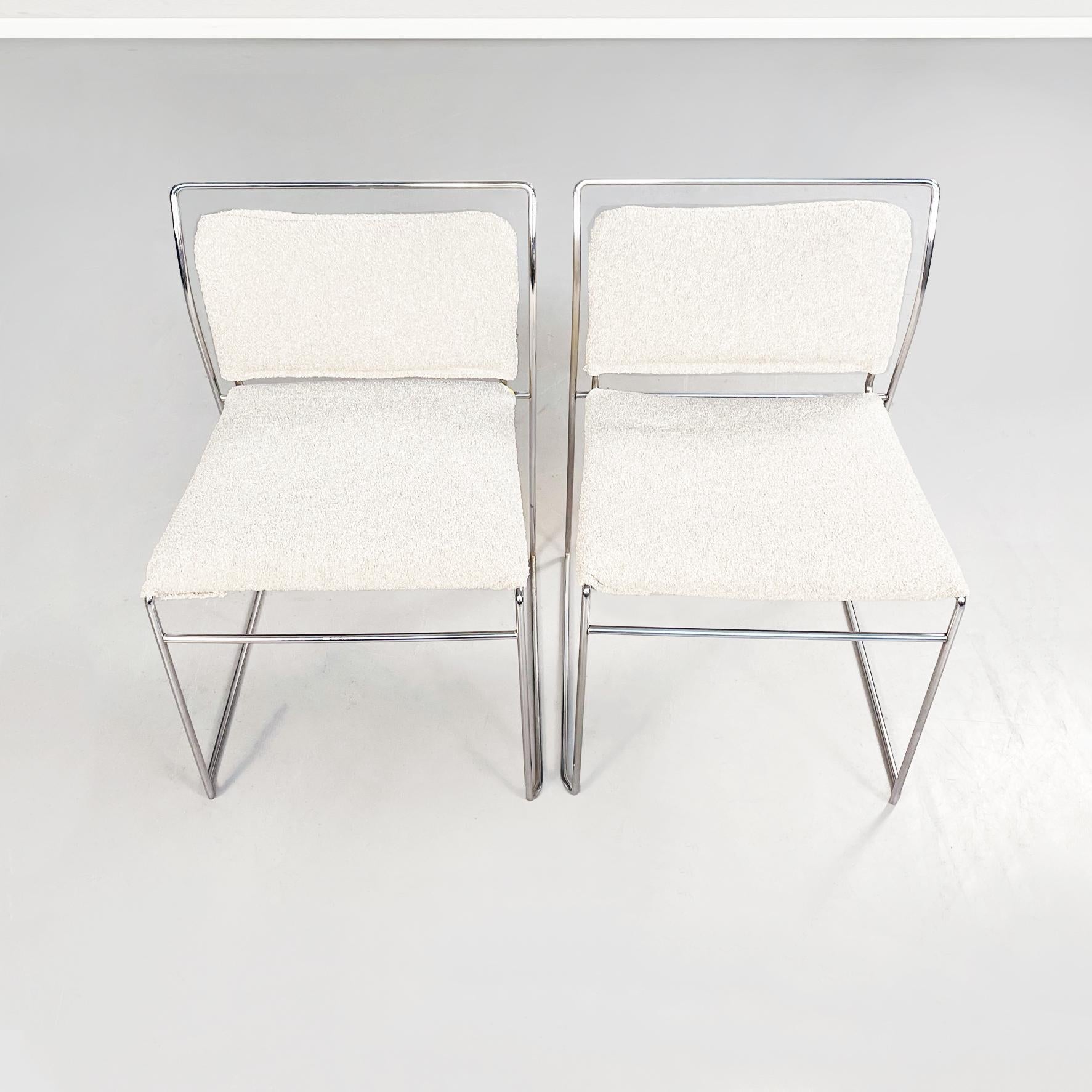 Italian mid-century Bouclè fabric and steel Tulu chairs by Takahama for Cassina, 1968
Pair of Tulu chairs with rectangular seat, padded and covered in bouclè fabric. The tubular structure in stainless steel is visible. The seat fabric is supported