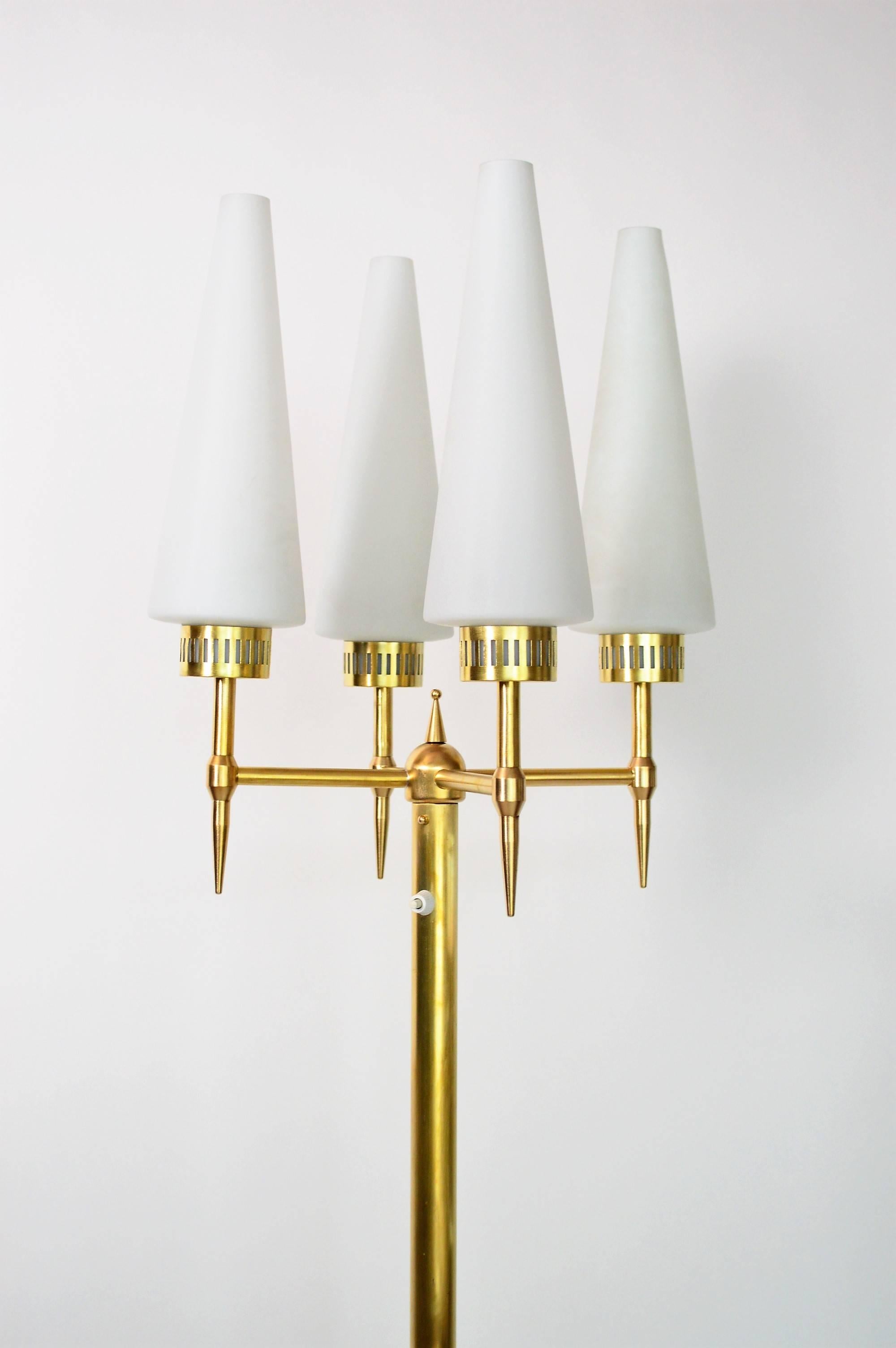 Gorgeous floor lamp with shiny brass lamp's base and details and four frosted glass shades.
All brass details have been polished and are very shiny as in original condition, the four glasses are in mint condition. The original on/off switch works